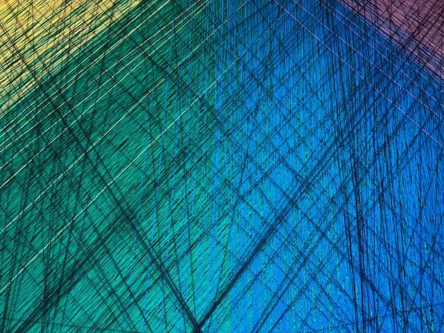 interweaving of colored threads