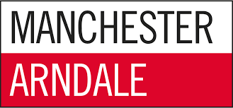 Sign displaying the text 'Manchester Arndale' with 'Manchester' in black and 'Arndale' in white on a red background.