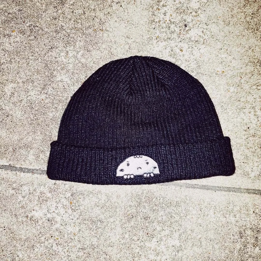 Very excited to release this new embroidered cable beanie -pictured here on a local piece of wo.jpg