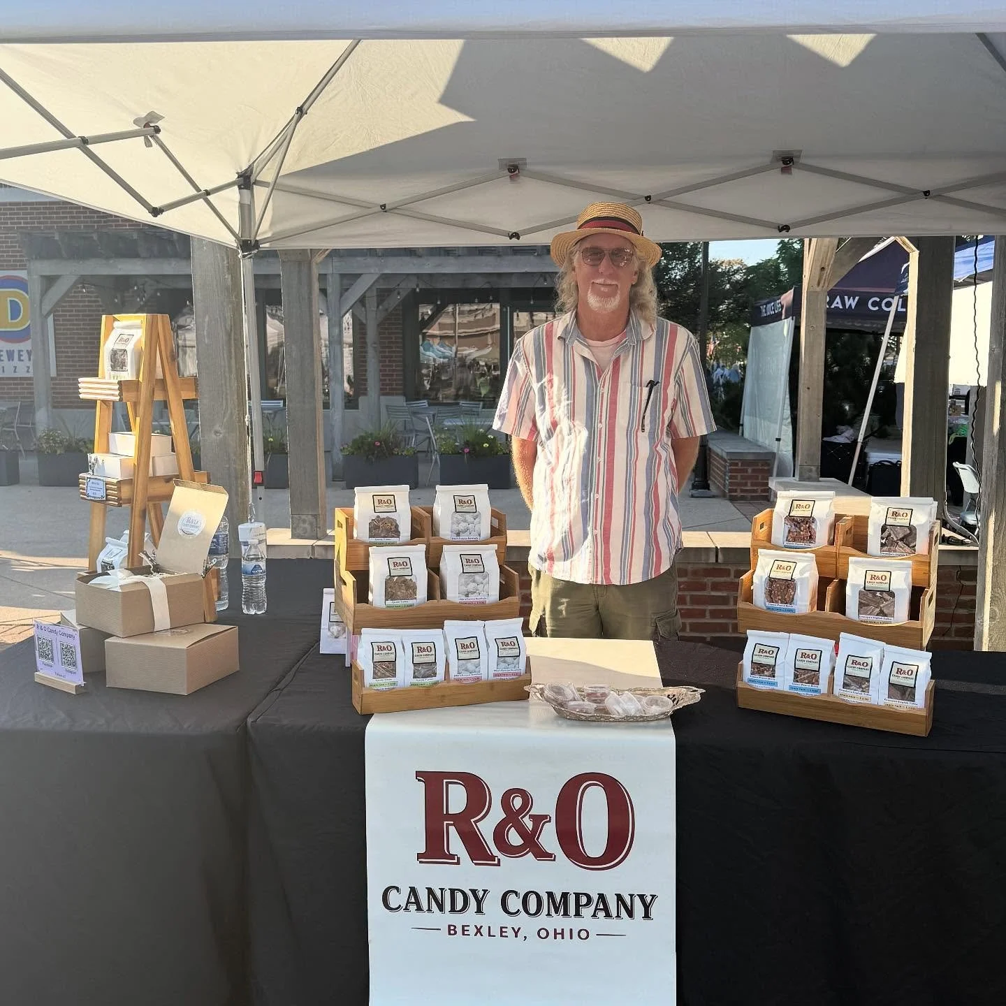 Swing by and say good morning to our new vendors @ro.candy.co and @bocadoflavorco during their Preview Day! We also have the wonderful folks at @fairytalesandtinytailsrescue for our community table- Winnie is greeting folks in her butterfly costume!