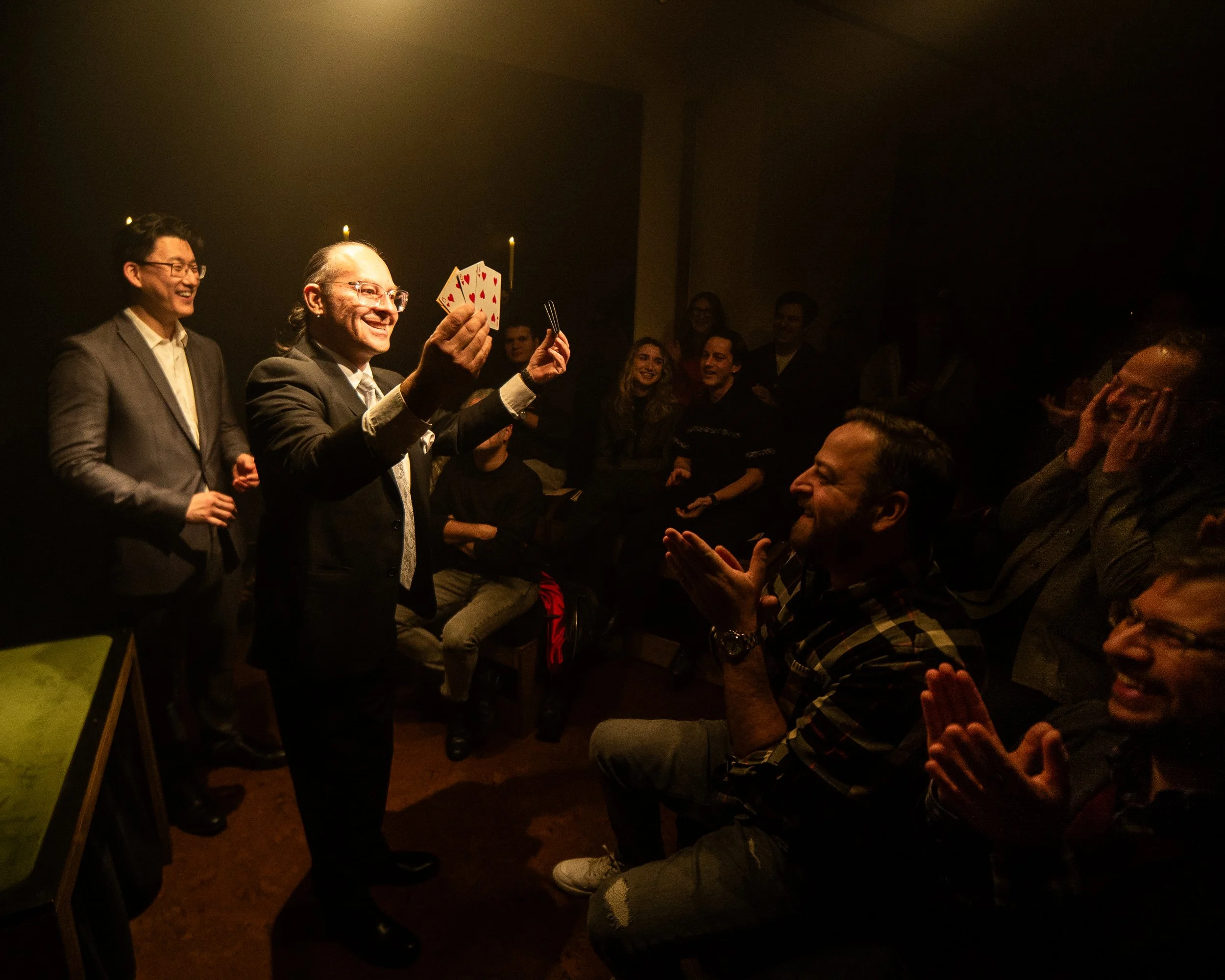 A magician performs an intimate close-up card trick at 69 Atlantic in Brooklyn