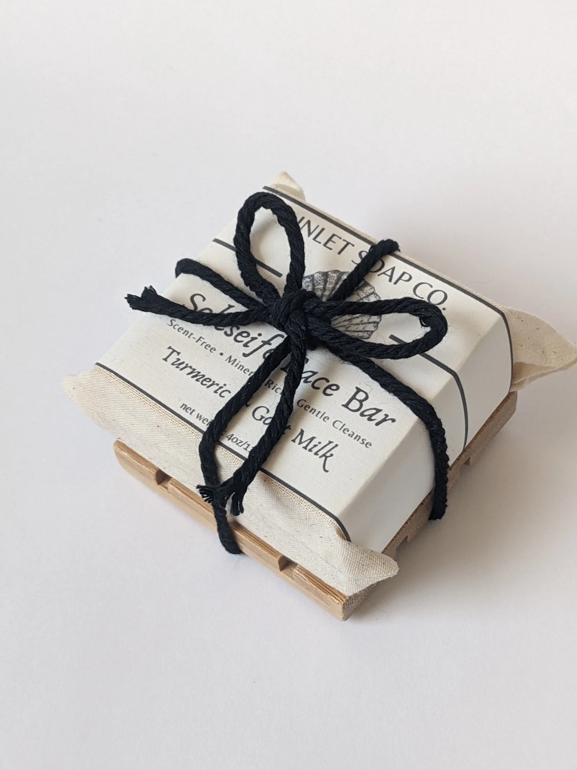 Soleseife Face and Body bar tied in a neat black bow.