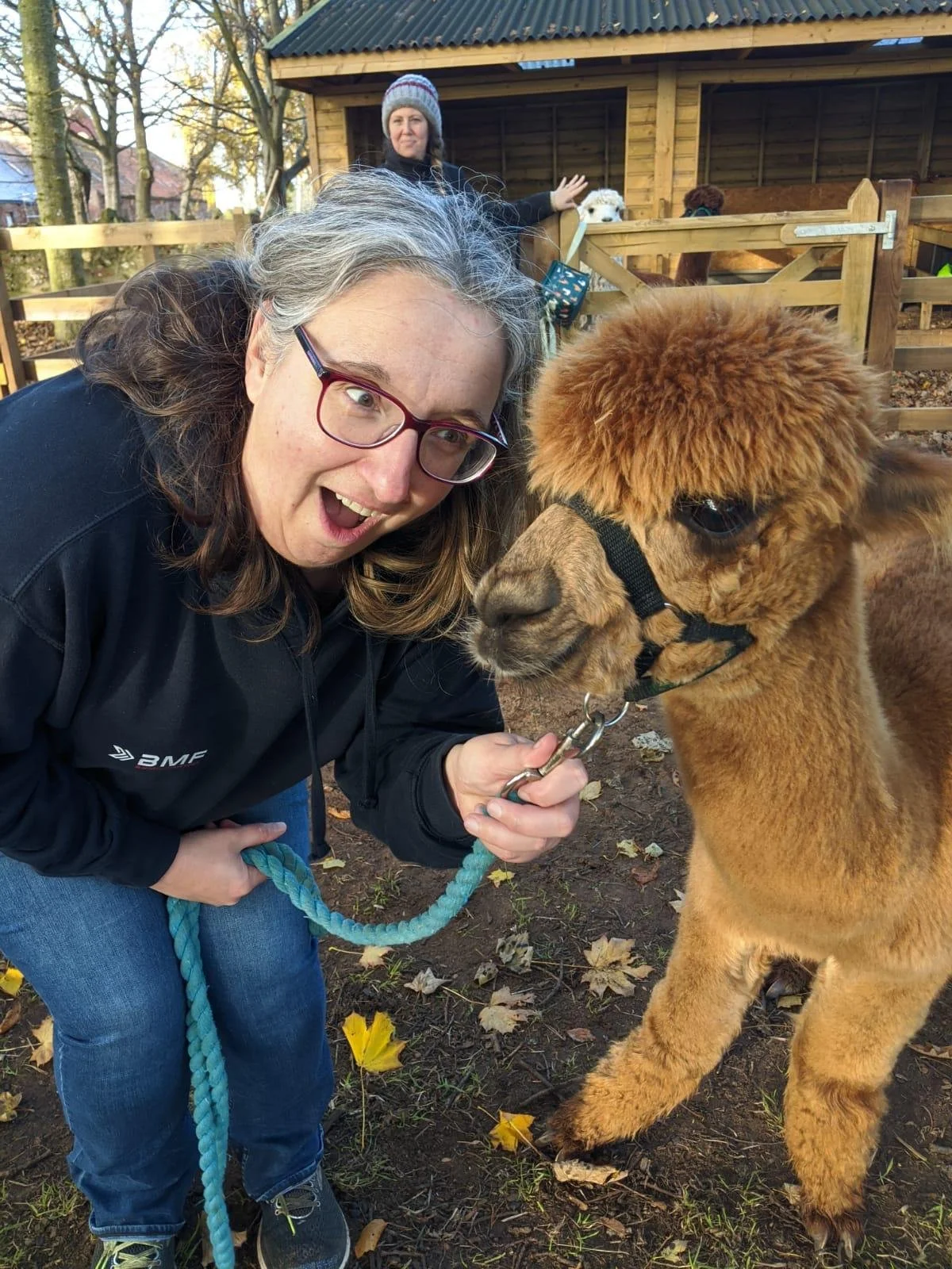 Image shows Heather with an alpaca