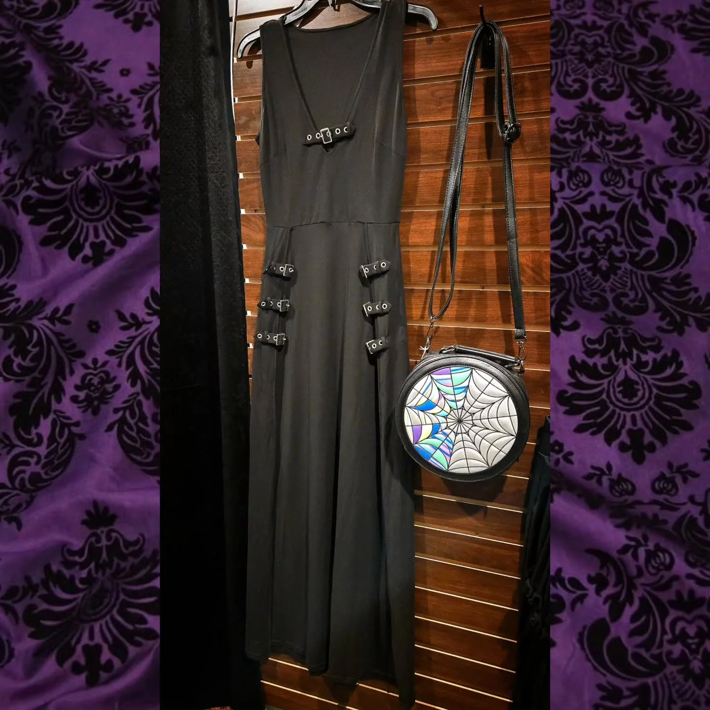 Our Wednesday bag pairs perfectly with the Rosetta maxi dress! Come getyours today at Curiouser &amp; Curiouser AVL! 👻🦴
.
.
.
.
.
.
.
.
.
.
.
.
.
.
.
.
.
.
#wednesday #addamsfamily #alternativefashion #gothootd #noveltypurse #pursecollection #ashev