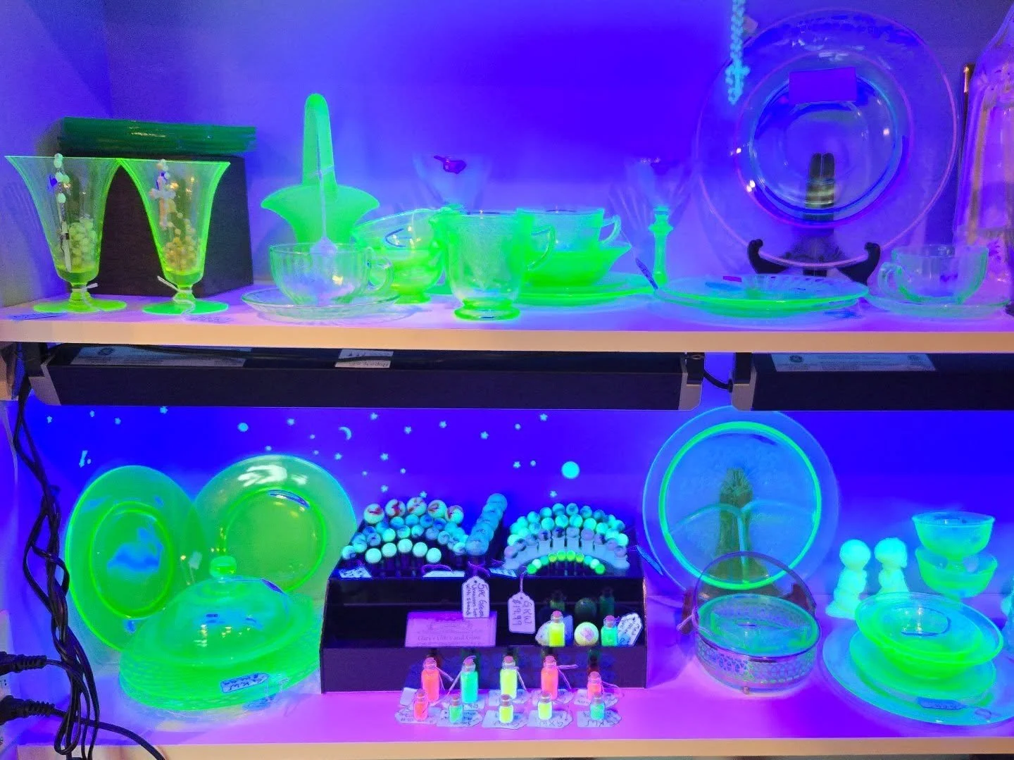 ✨️ @batcountryvintage just brought in a TON of new uranium glass pieces! Come check them out today at @curiouserboutiqueavl 
Located at 117 Sweeten Creek road in Asheville