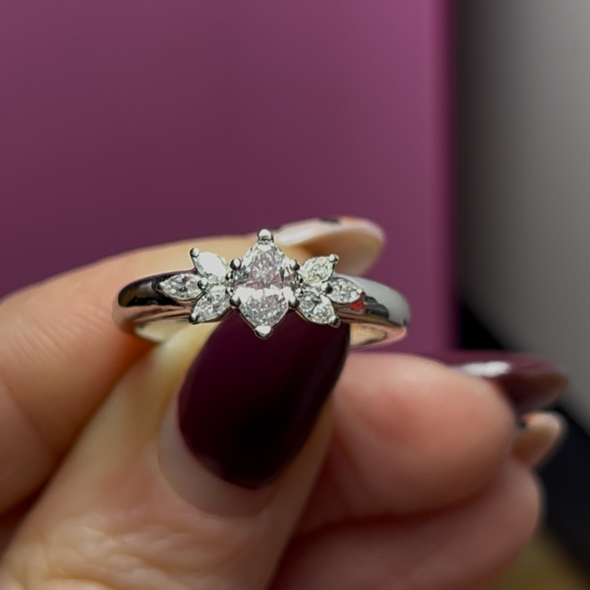 A custom made white gold marquise diamond ring by TSC Jewelry