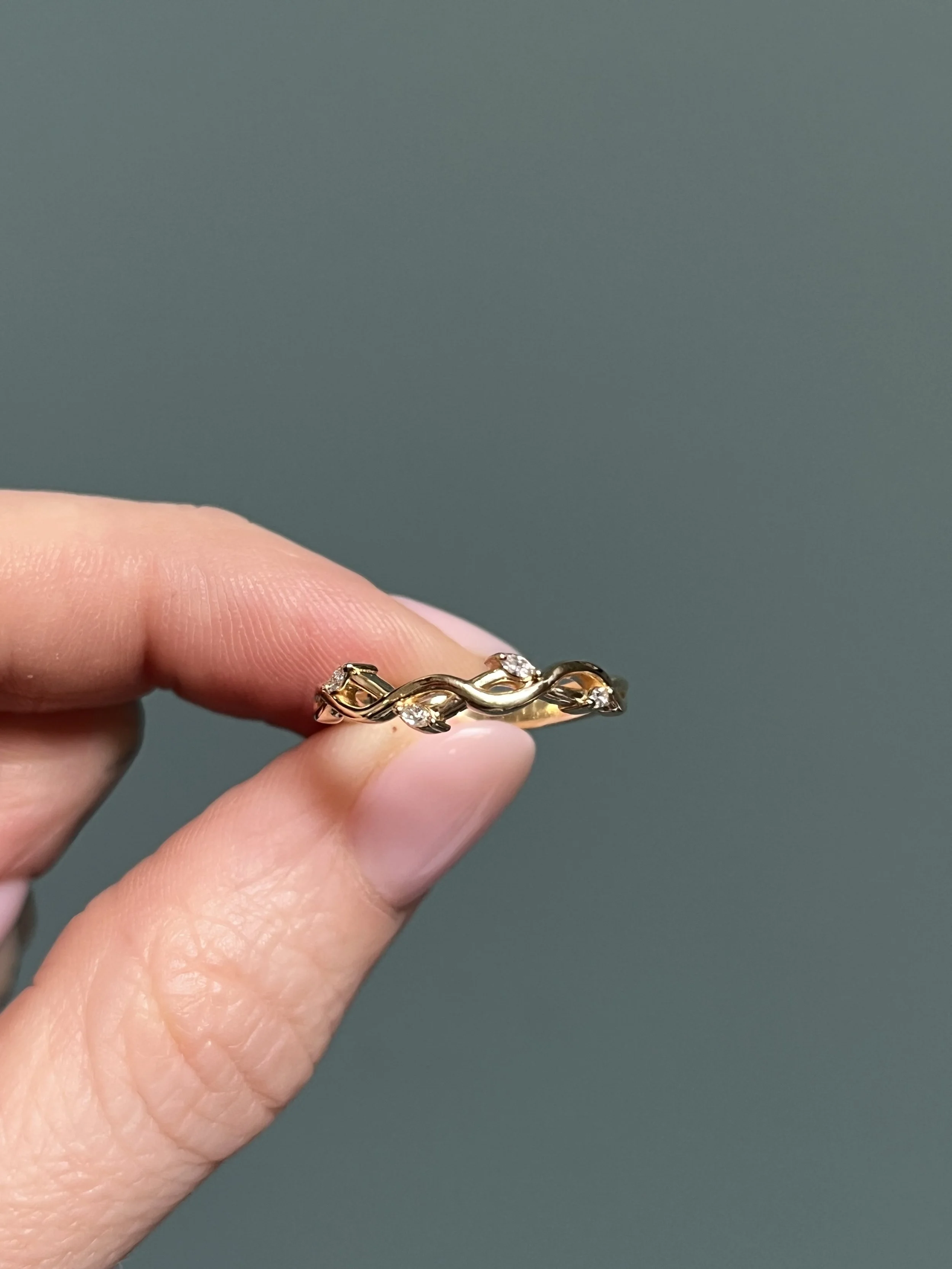 A nature vine-inspired diamond band by TSC Jewelry