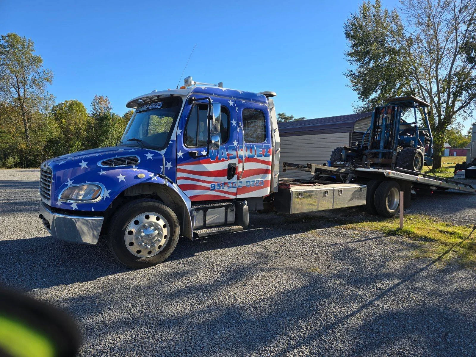 Freightliner with forklift.jpeg