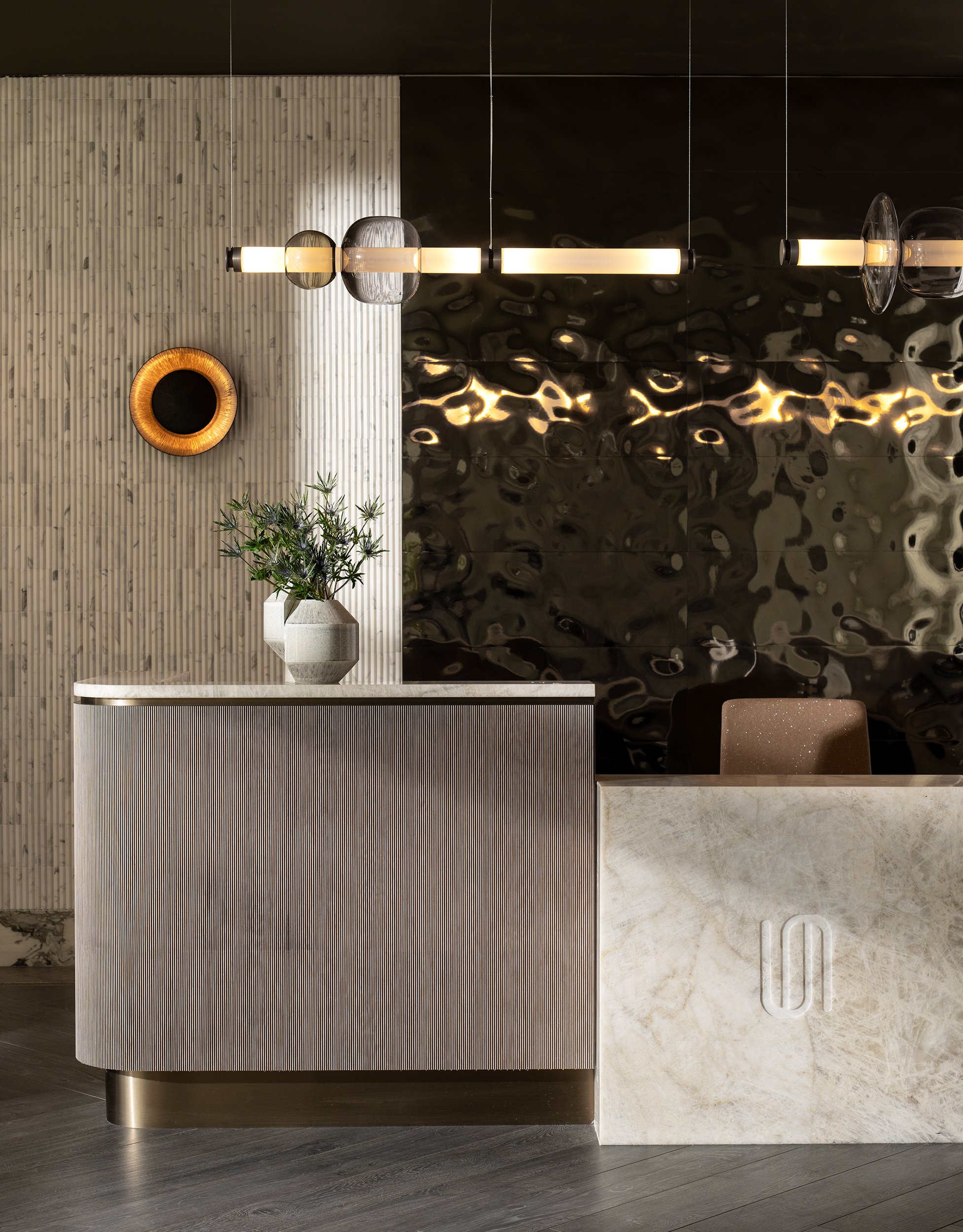 Priano - Lobby - Reception Desk - Portrait with Lights Illuminated.jpg
