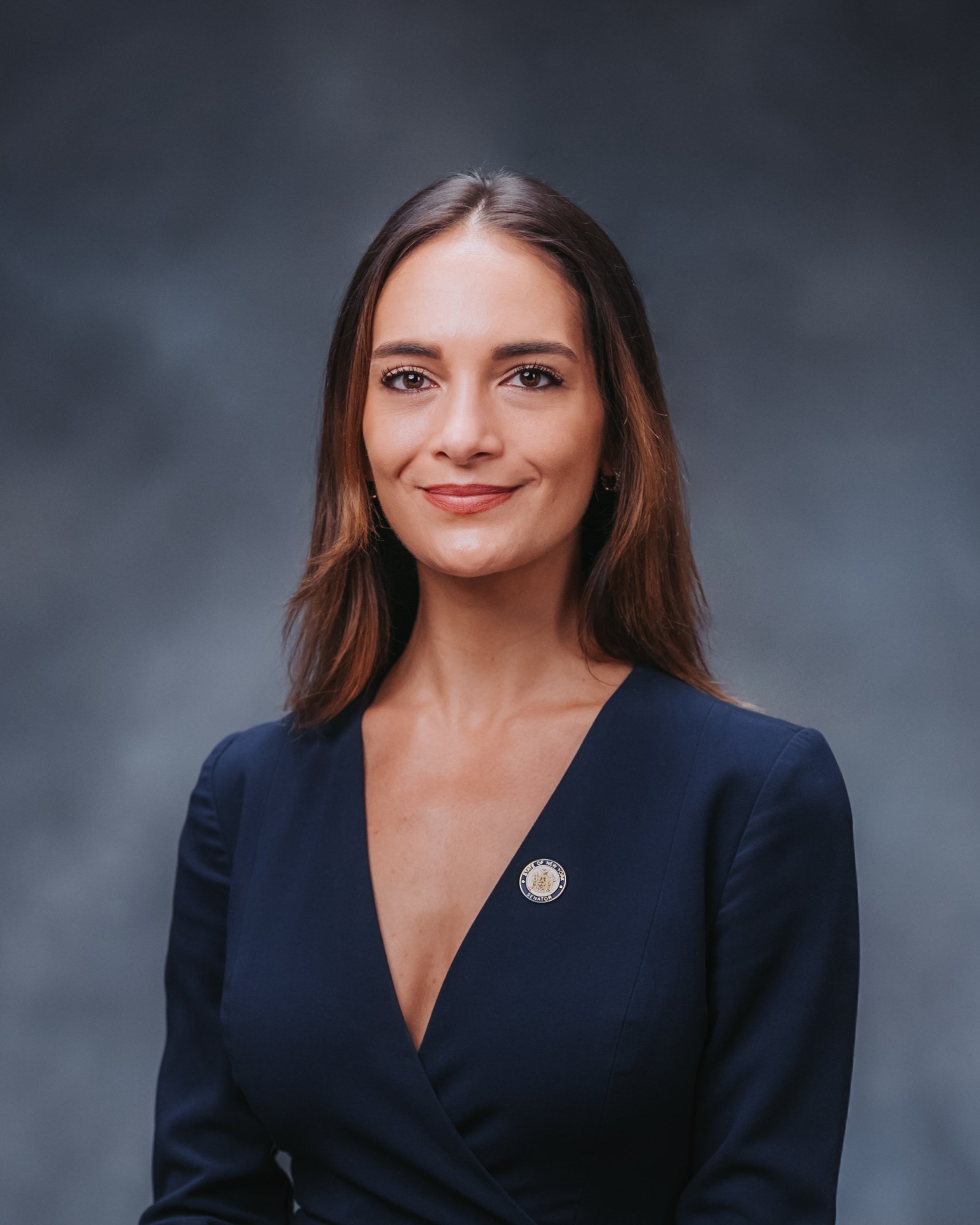 Senator Julia Salazar signs the cash champion pledge