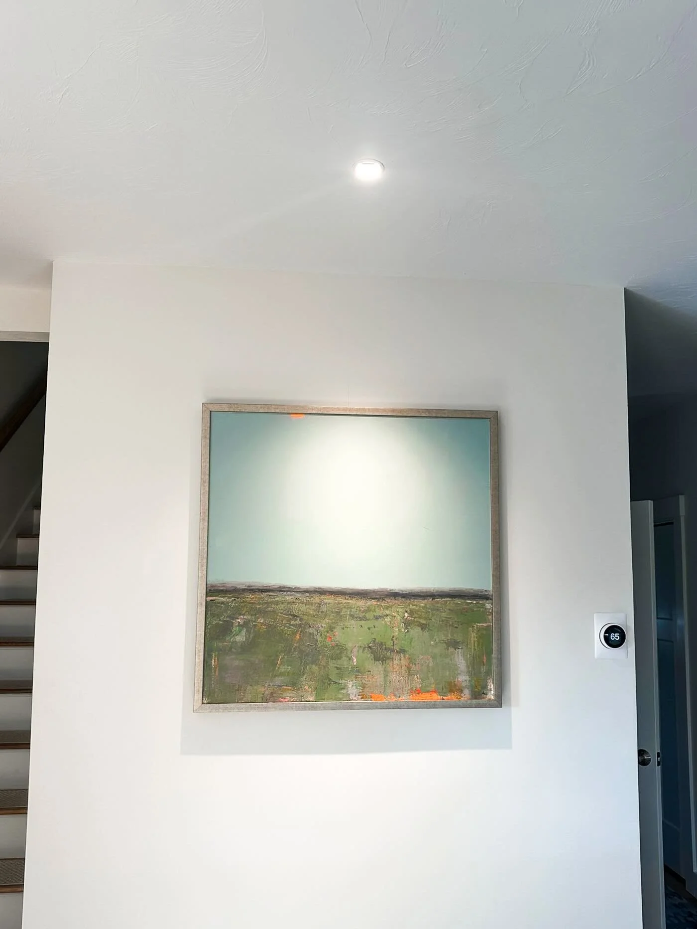 Directional recessed lighting transformed this living space into an art gallery. Interested in doing the same? Give us a call to schedule a free consultation!

#homegallery #electricservices #homedecorating