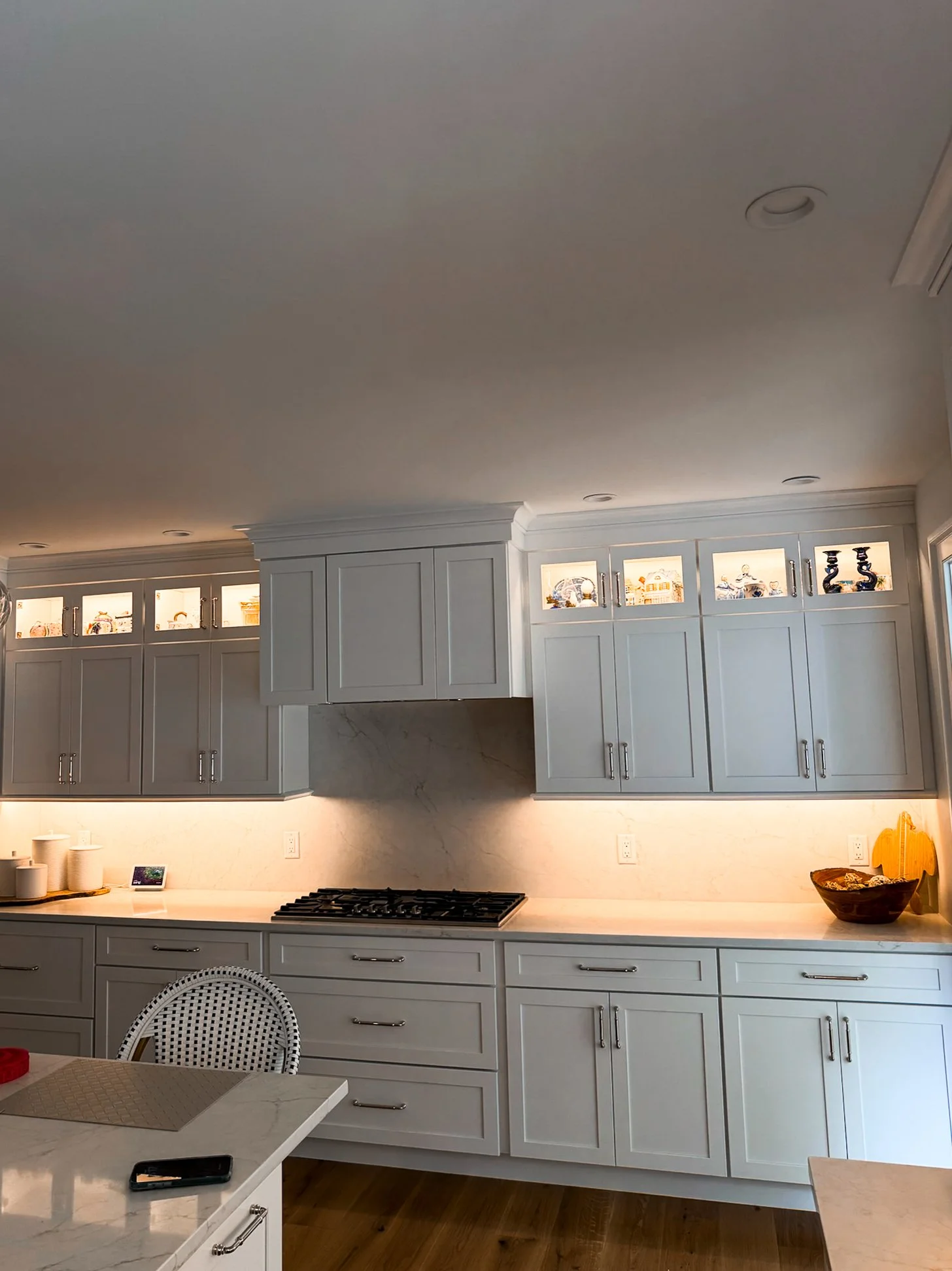 Under cabinet and in-cabinet lighting wired by Plymouth, MA electricians Puopolo Electric