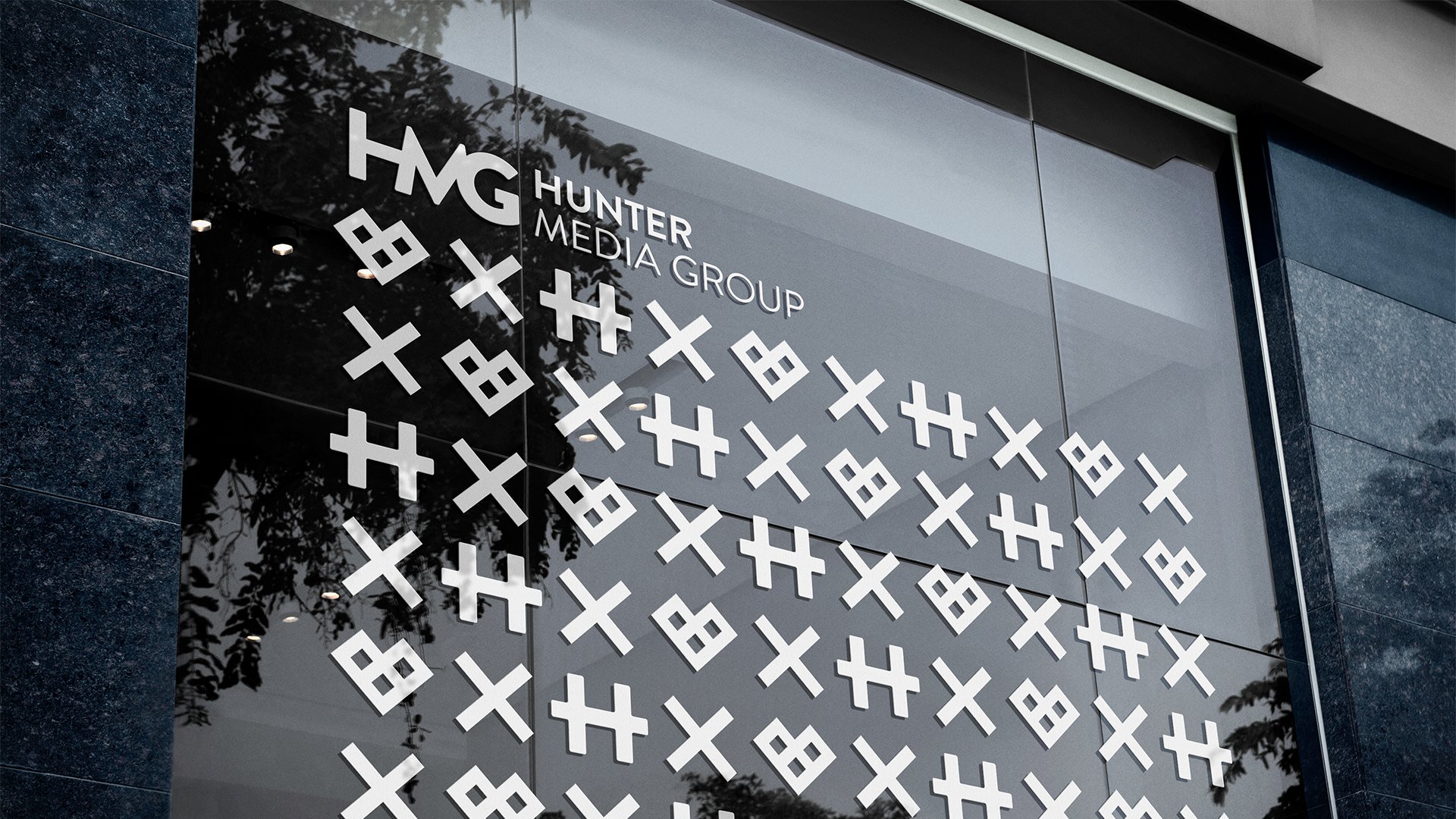 Hunter Media Group Logomark Suite Repeat Pattern Office Window Graphic