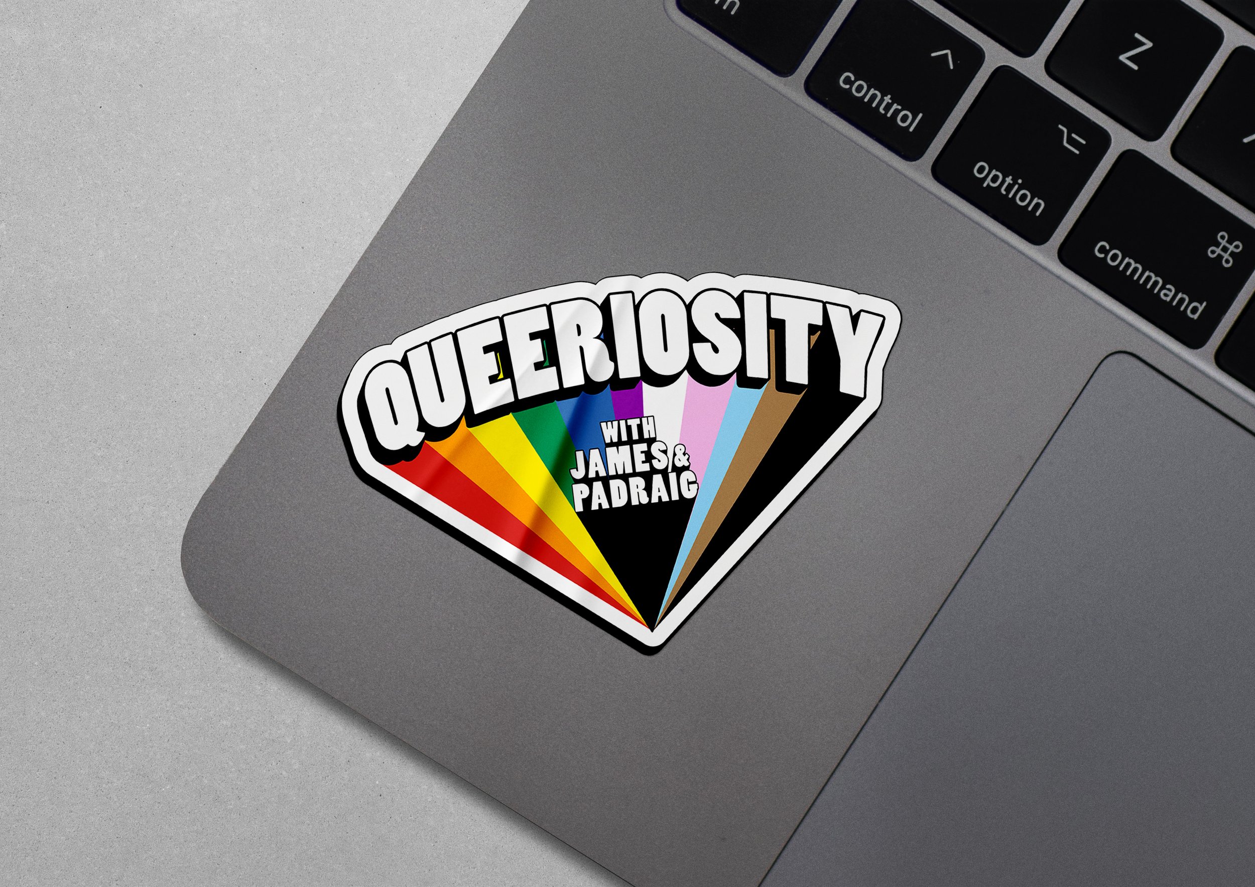 Queeriosity Logo Sticker on Laptop