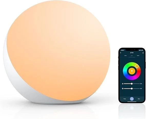 A circular, white Hifree Smart Table Lamp emitting an orange glow, positioned next to a smartphone displaying a color wheel interface for lamp control.