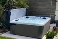 Outdoor hot tub with cover