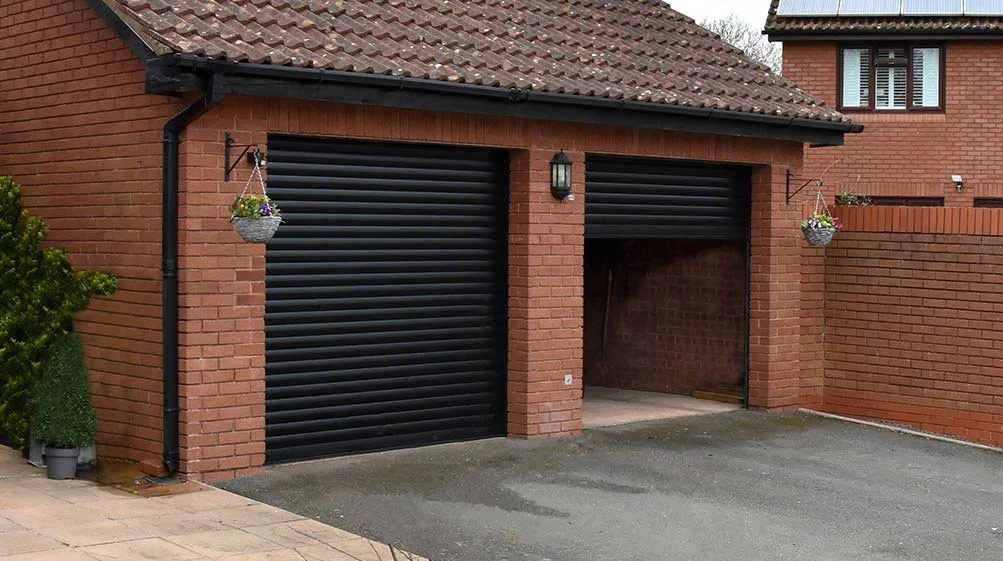 doublerollergaragedoorinjetblack_2c067bdd-b2d5-4a5c-9bc8-7919fc316b7c_1003x.jpg