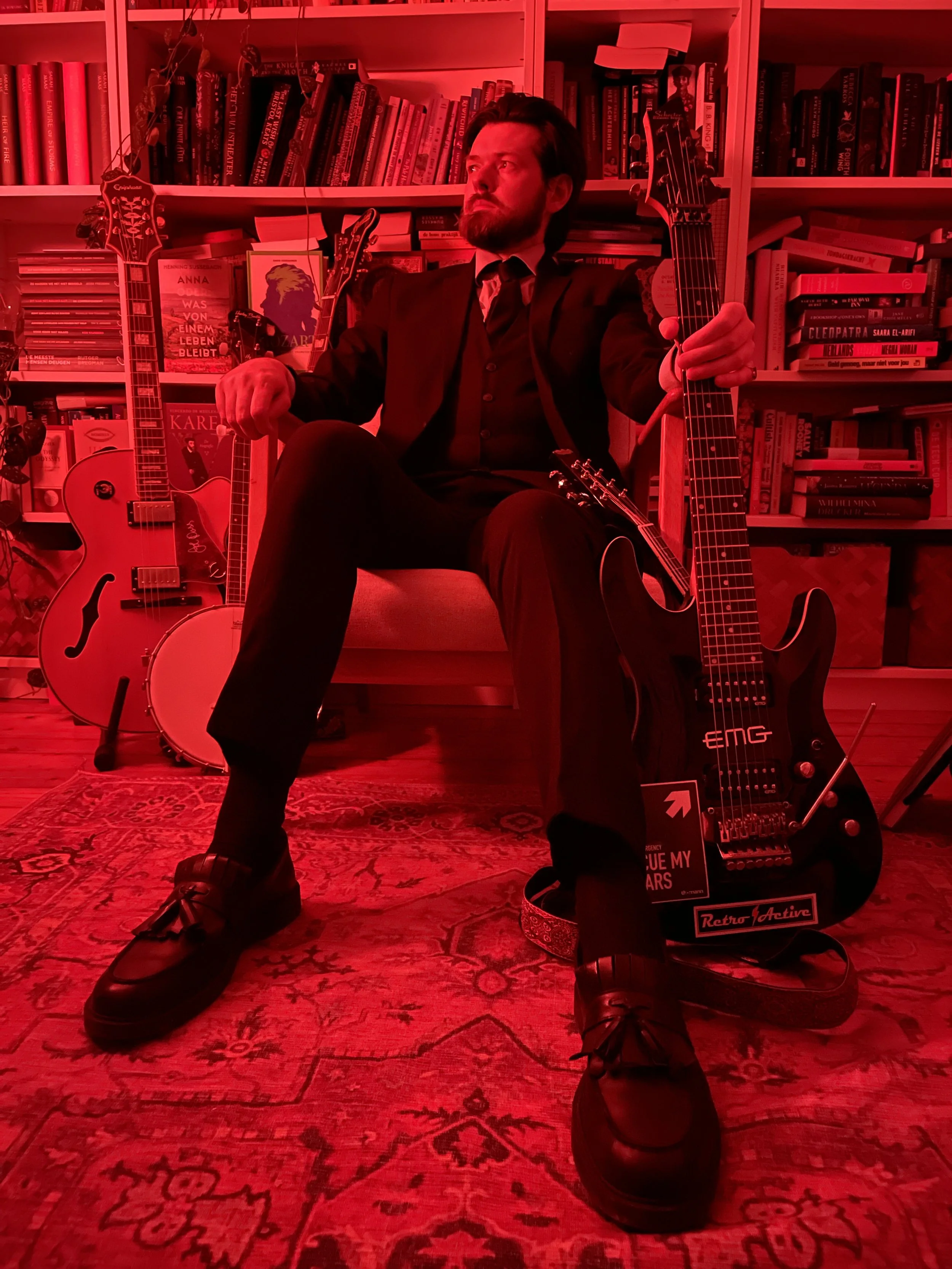 Me in a three piece suit, my instruments, with only red light.