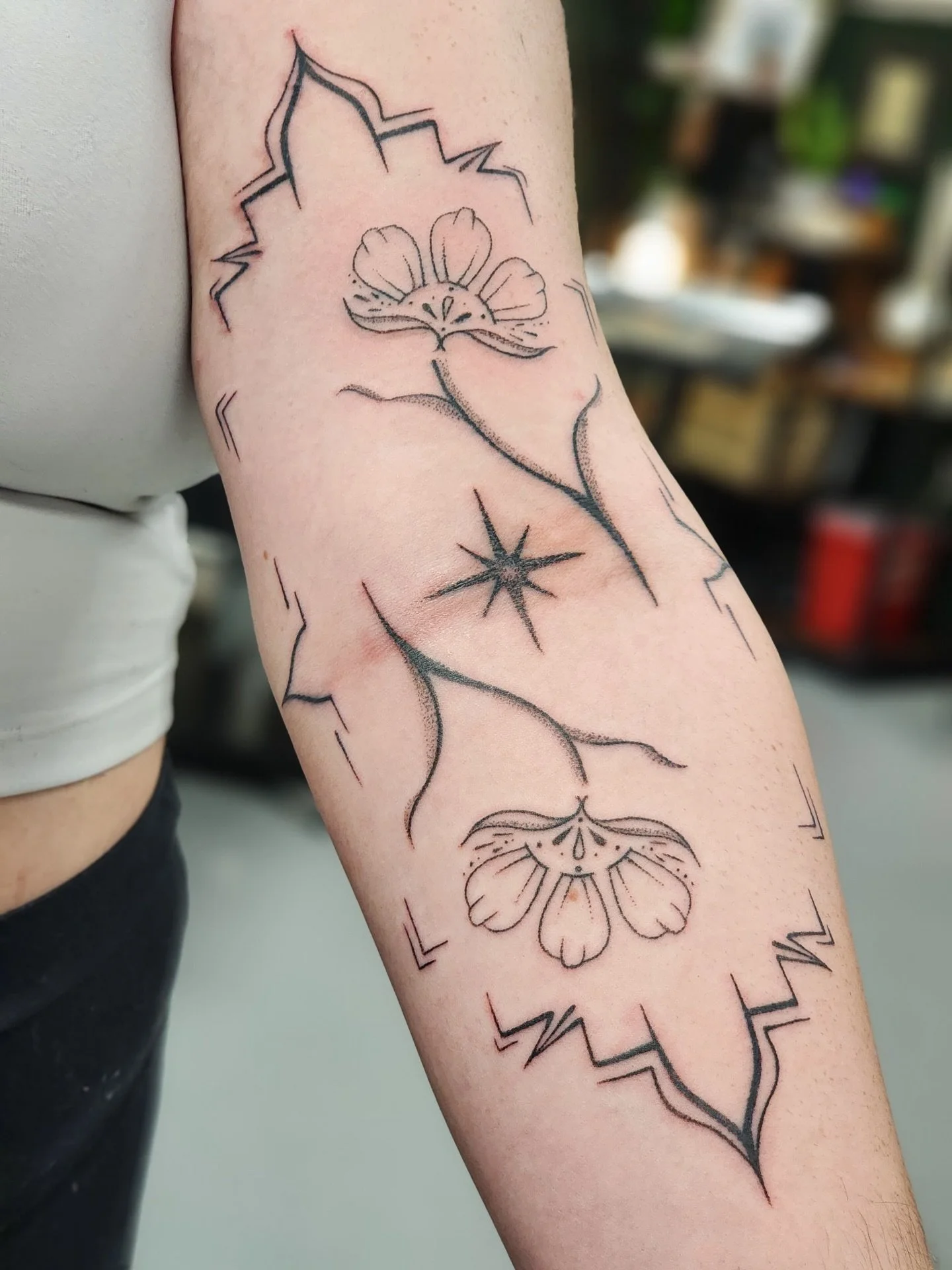 An ornamental floral piece, designed and tattooed by Ramiah for Helena. The symmetry of this design and the flow of the tattoo with the body is beautifully done, and we can&rsquo;t wait to see what Ramiah comes up with next. 

If you love how open an
