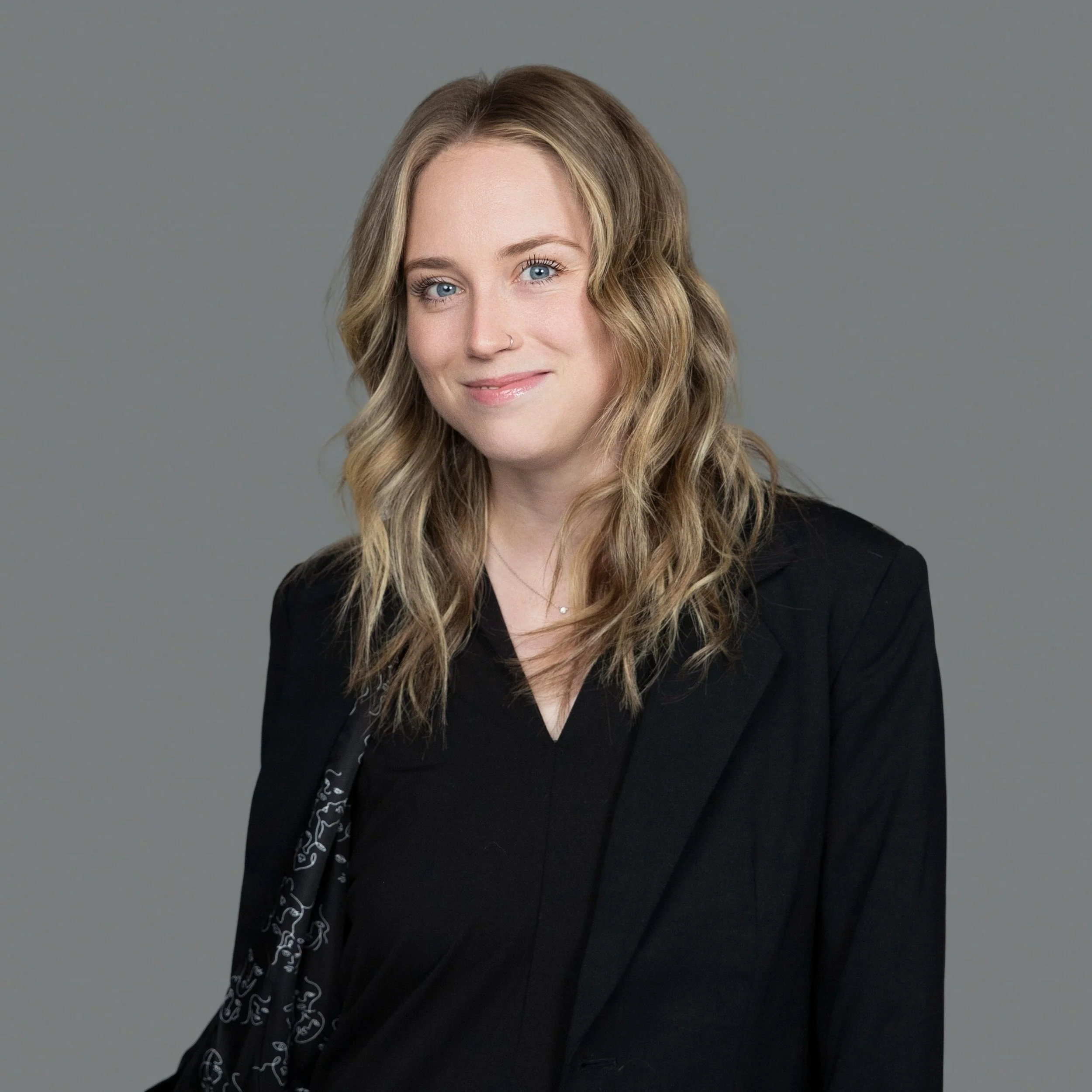 Professional headshot of medical AI company representative for healthcare technology website and marketing