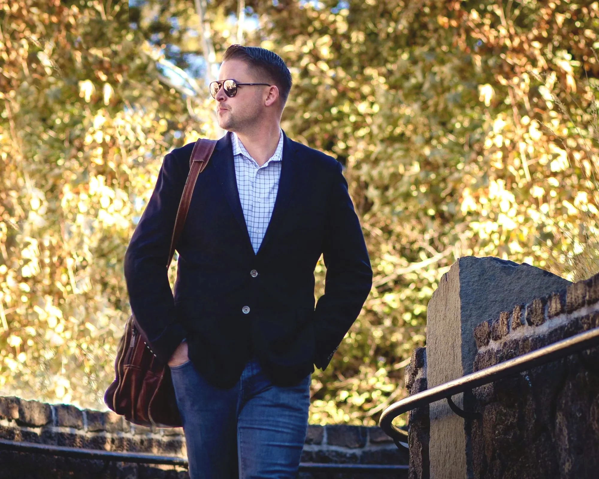 Realtor branding photo of a businessman walking outdoors in professional attire for website and marketing in Bend Oregon.