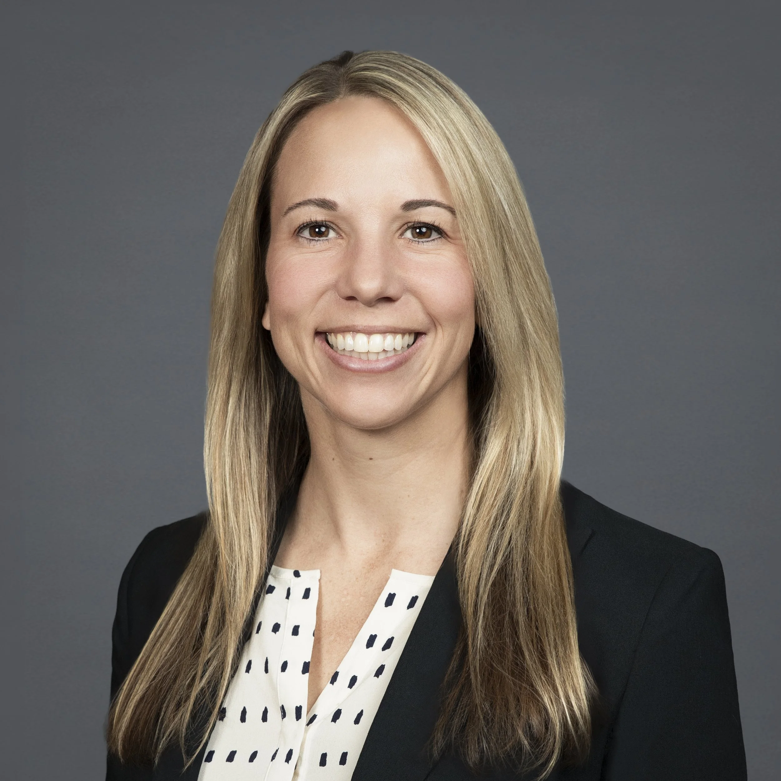 Professional lawyer headshot of woman in Bend Oregon with studio background