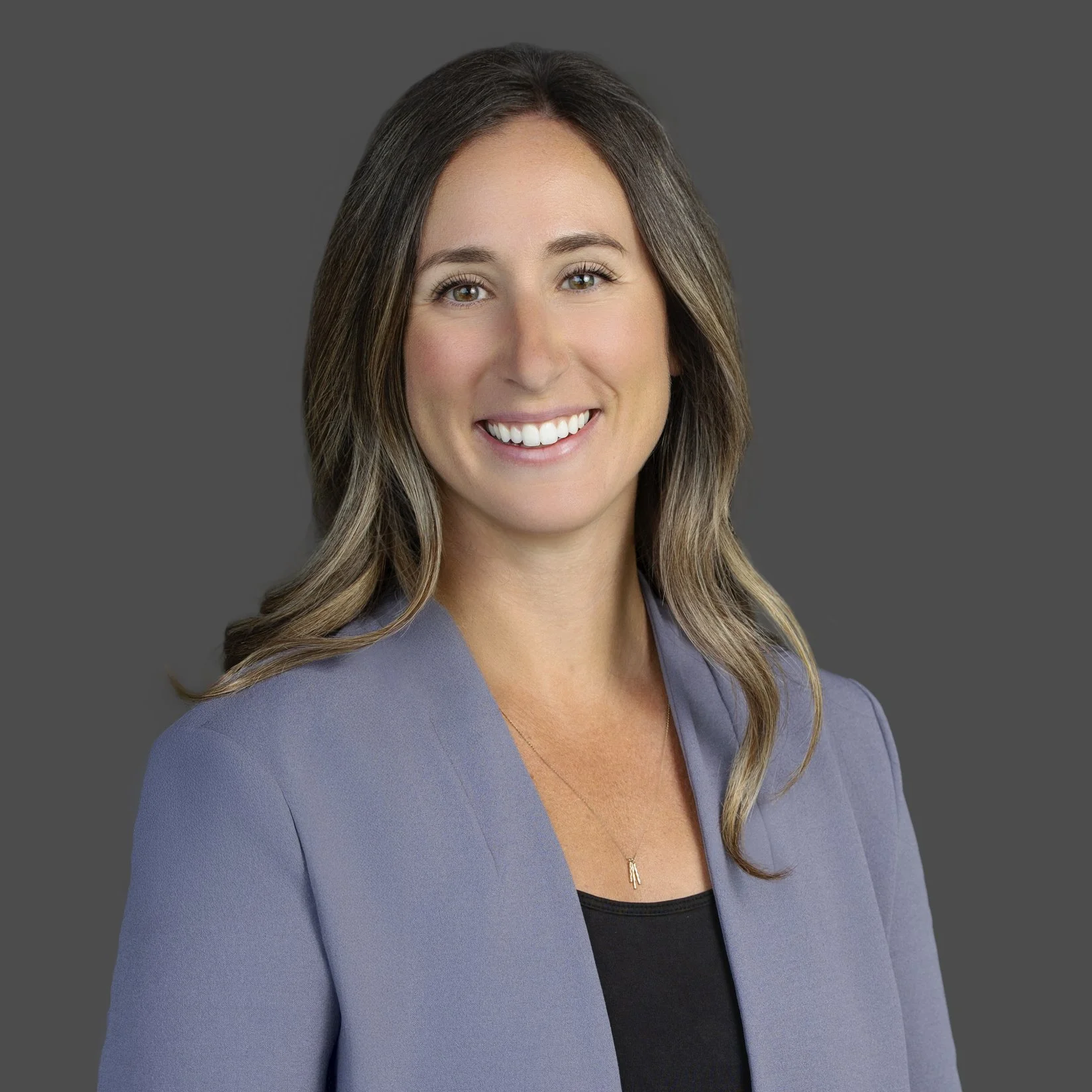 Modern corporate headshot of female professional at business conference in Central Oregon