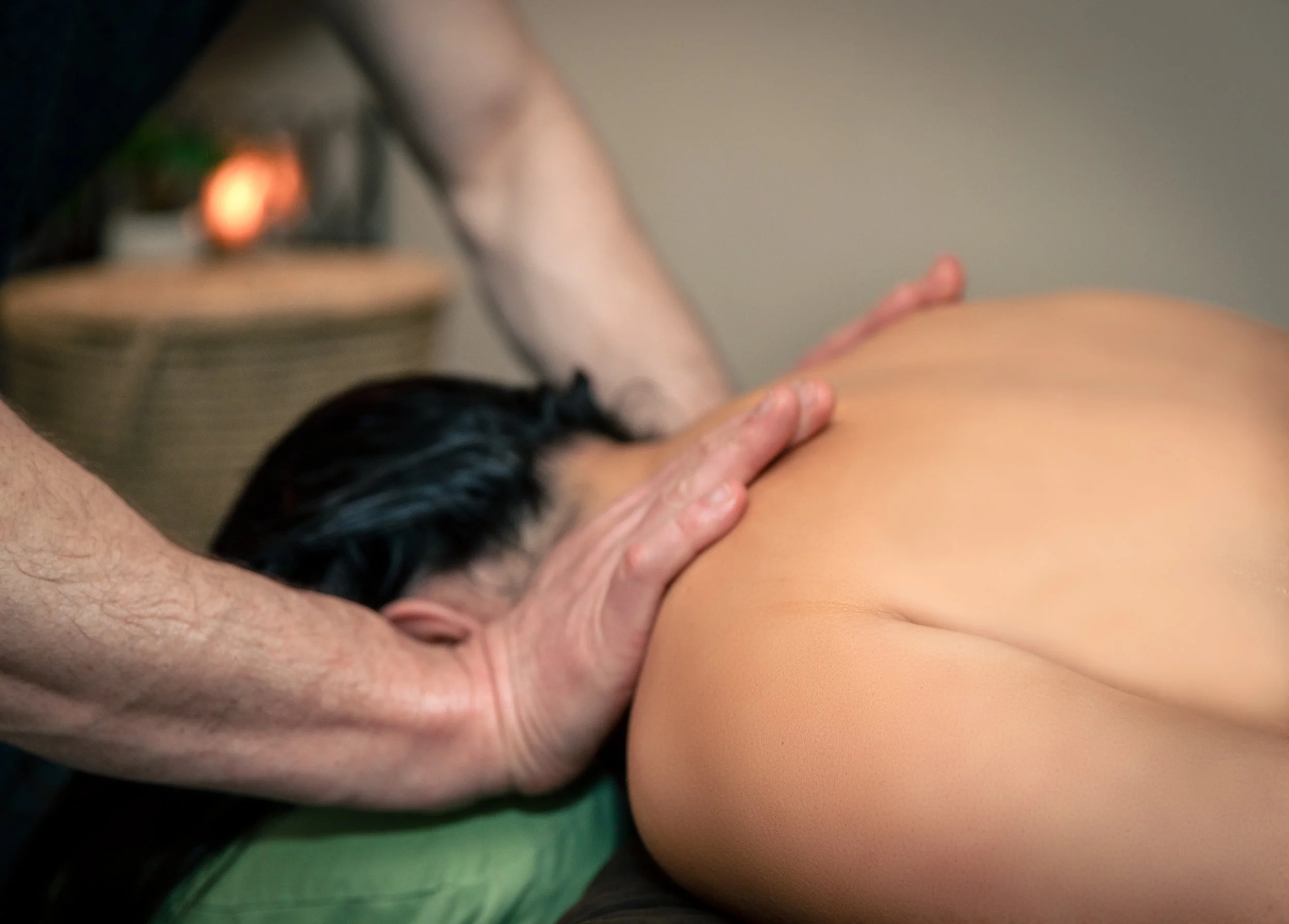 Relaxation massage therapy session focusing on back and shoulder tension relief