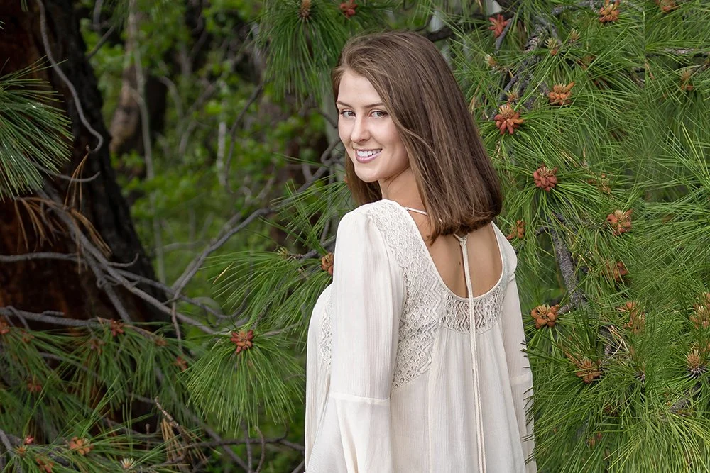 College graduate portrait session at Black Butte Ranch in Sisters Oregon with outdoor session