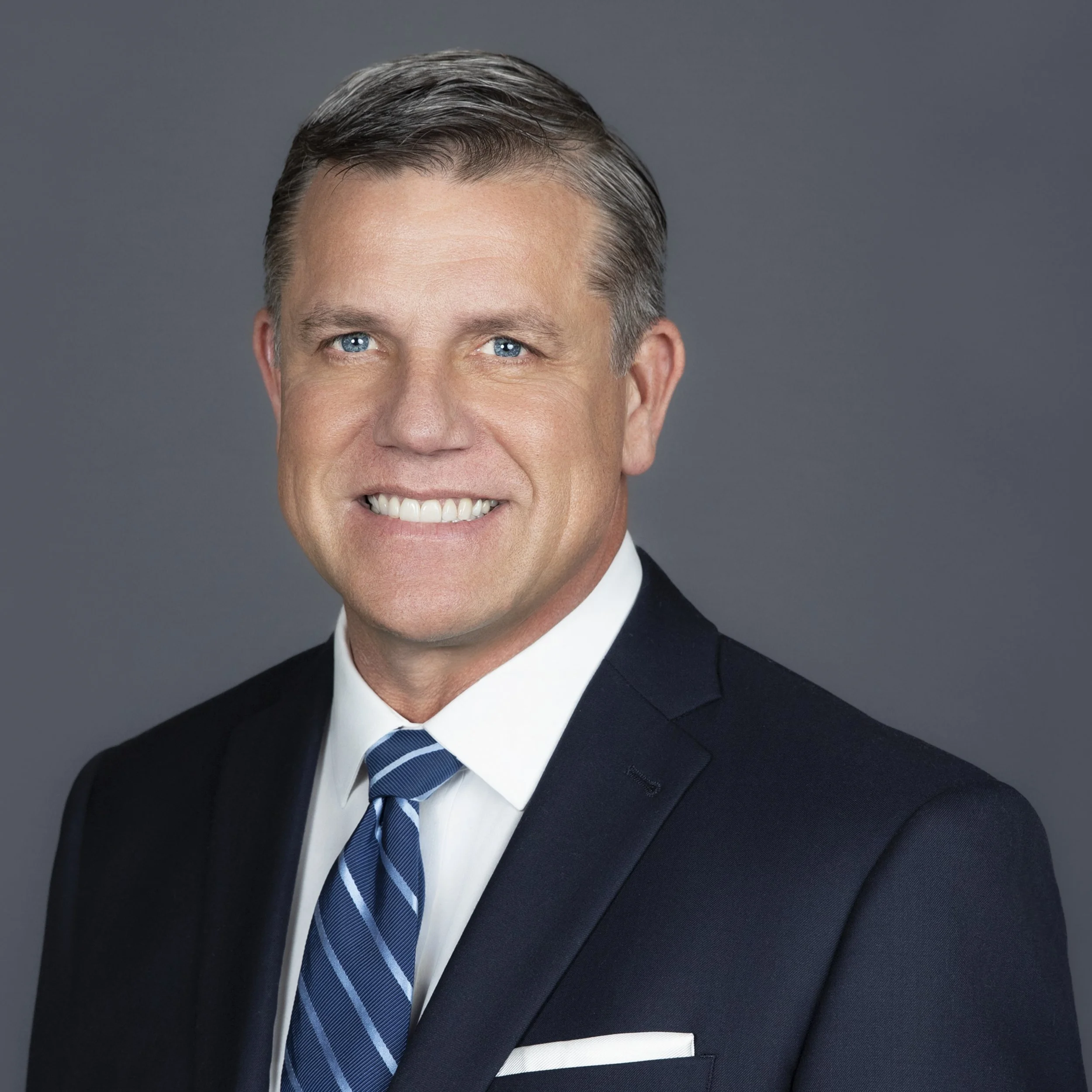 Updated professional studio headshot of businessman for website, LinkedIn, and corporate branding