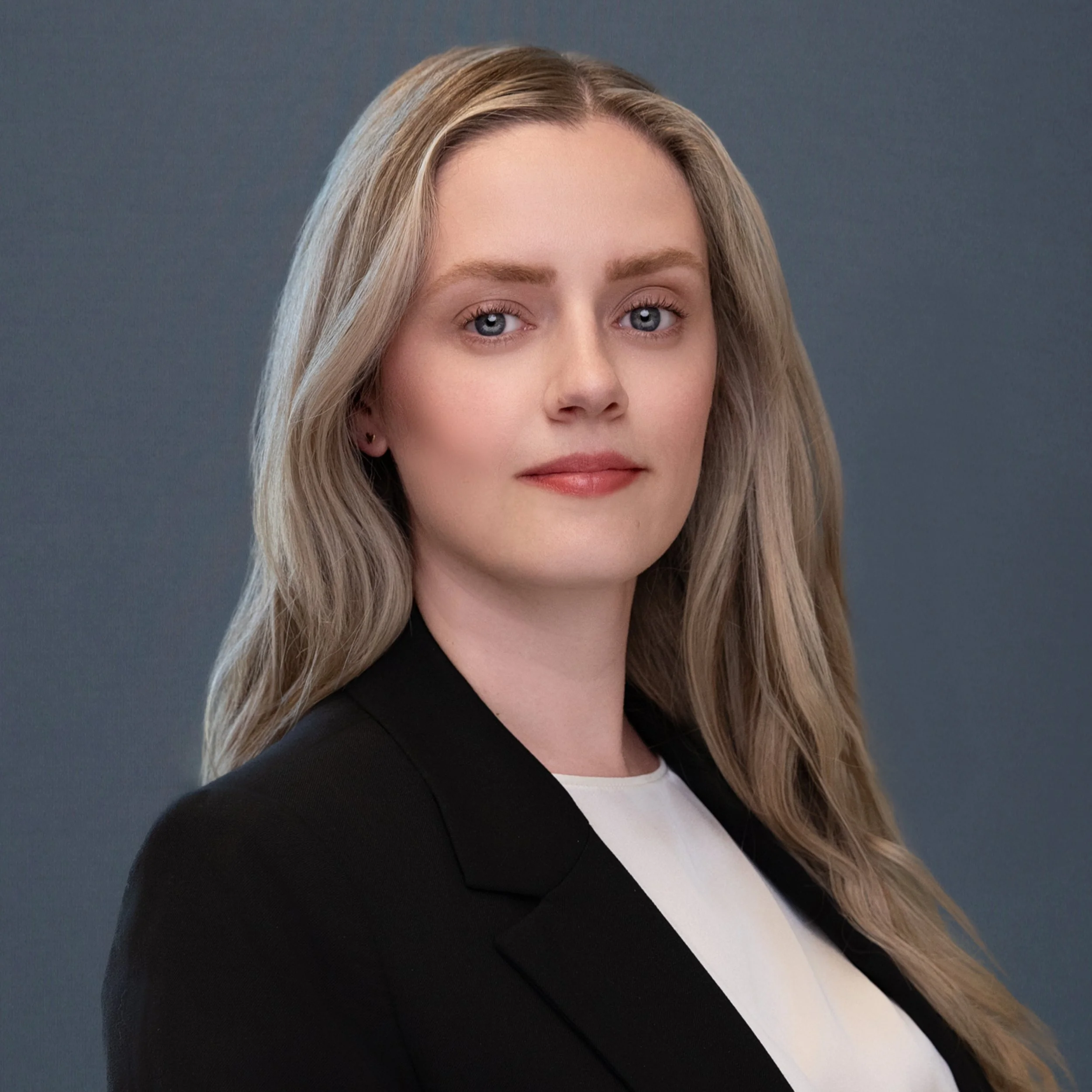 Modern headshot of business woman at off-site conference location natural expression in Bend Oregon