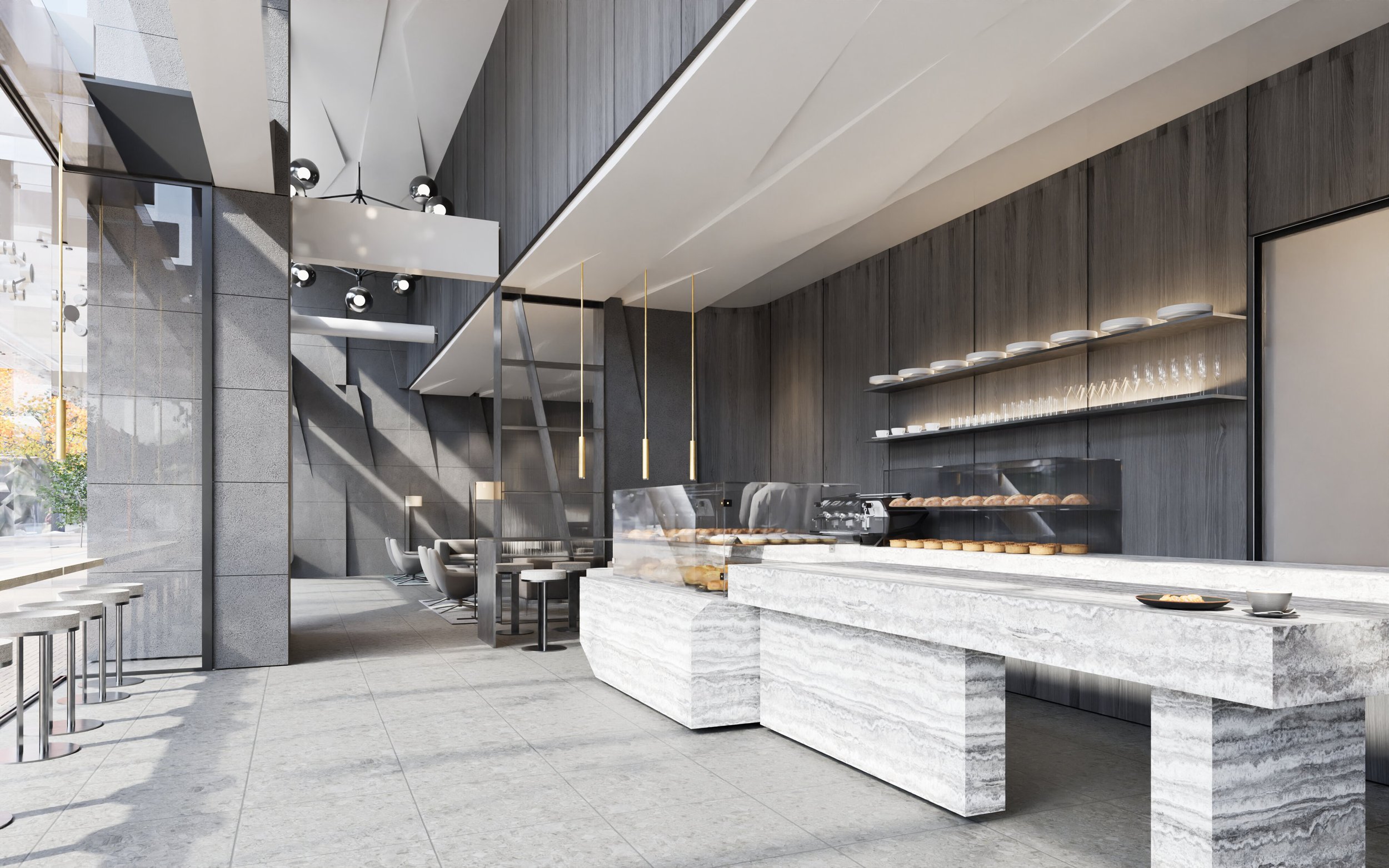 Modern coffee shop interior with minimalist design, featuring light gray stone counters, wooden panel walls, pastries on display, and seating area.