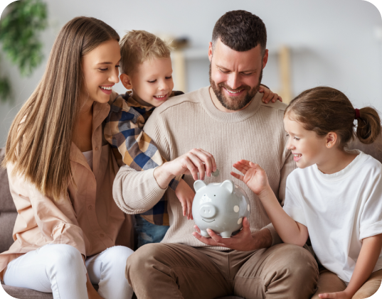 Family putting coins into a piggy bank, symbolizing saving and financial planning, creating family wealth