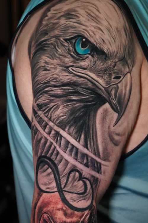 Detailed eagle realism tattoo by Axel at Salvation Tattoo Lounge in Coral Springs