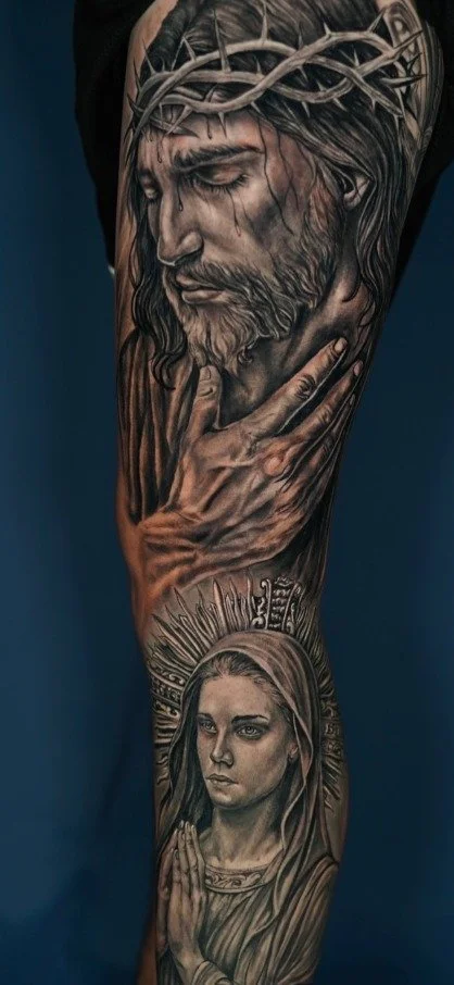 Black and gray Jesus and Virgin Mary religious tattoo sleeve by Axel at Salvation Tattoo Lounge Coral Springs
