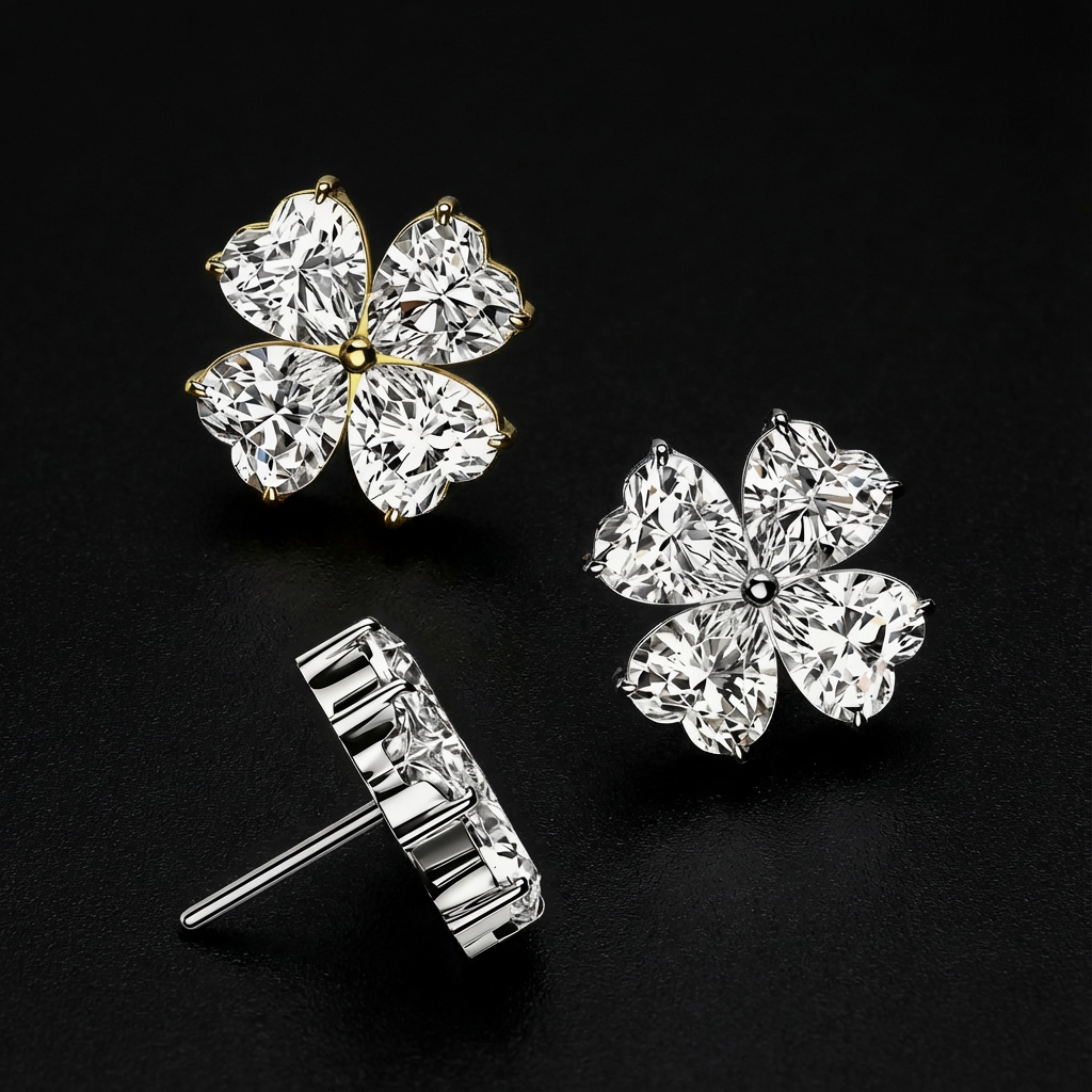 Front and side view of 14k gold flower diamond piercing jewelry on black stone surface