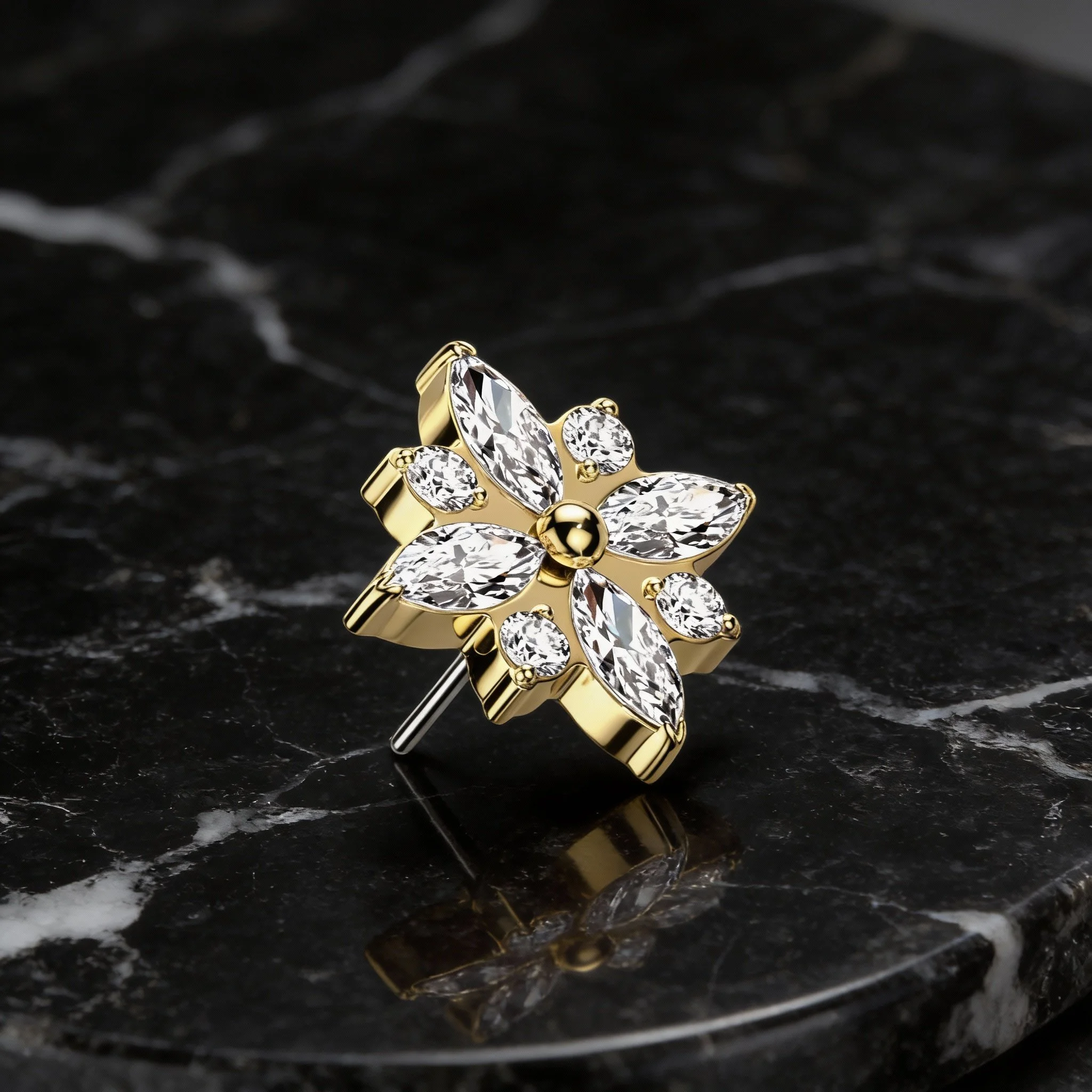 Back view of luxury 14k gold flower body piercing jewelry with diamond accents