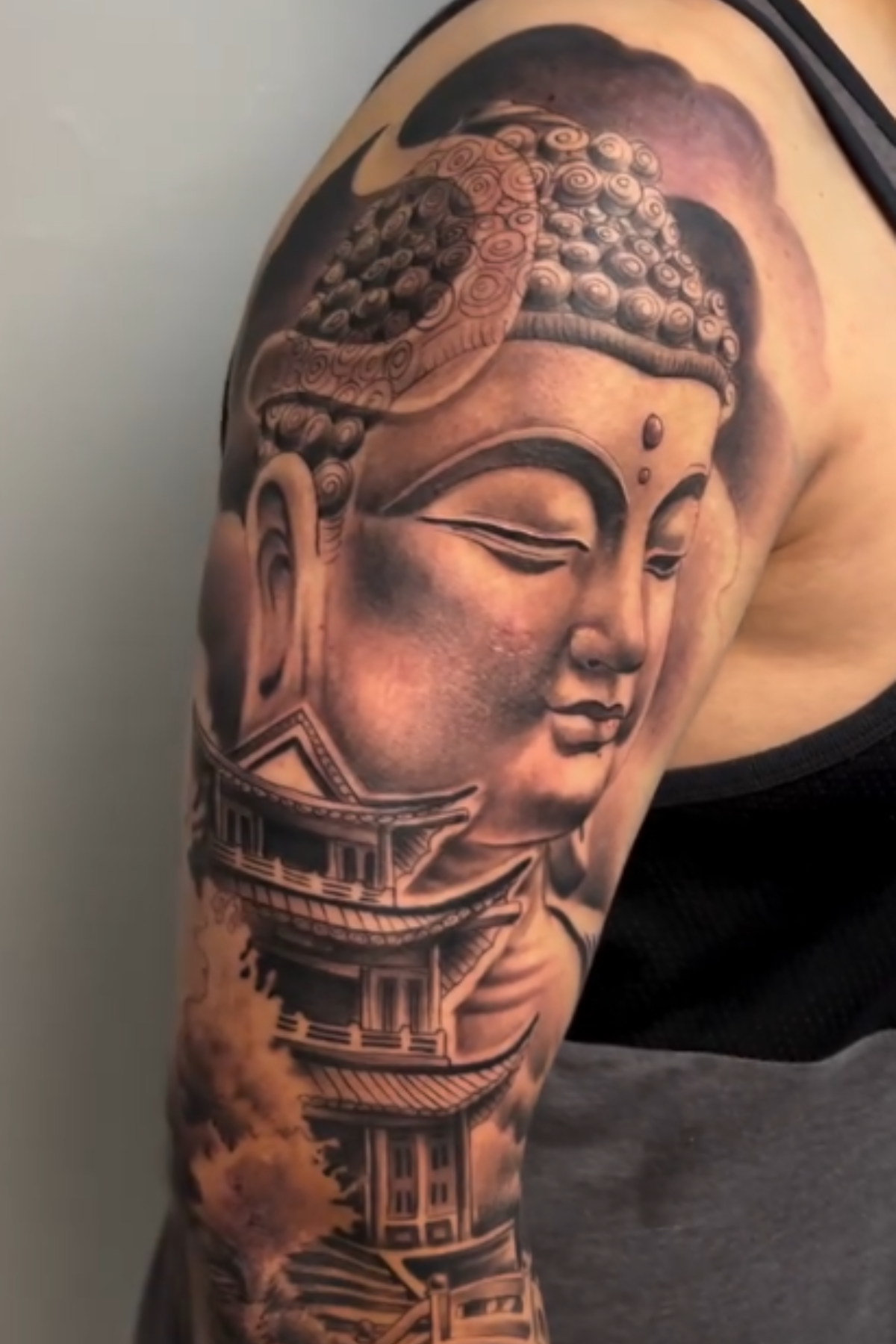 Detailed Buddha tattoo by Alfonso