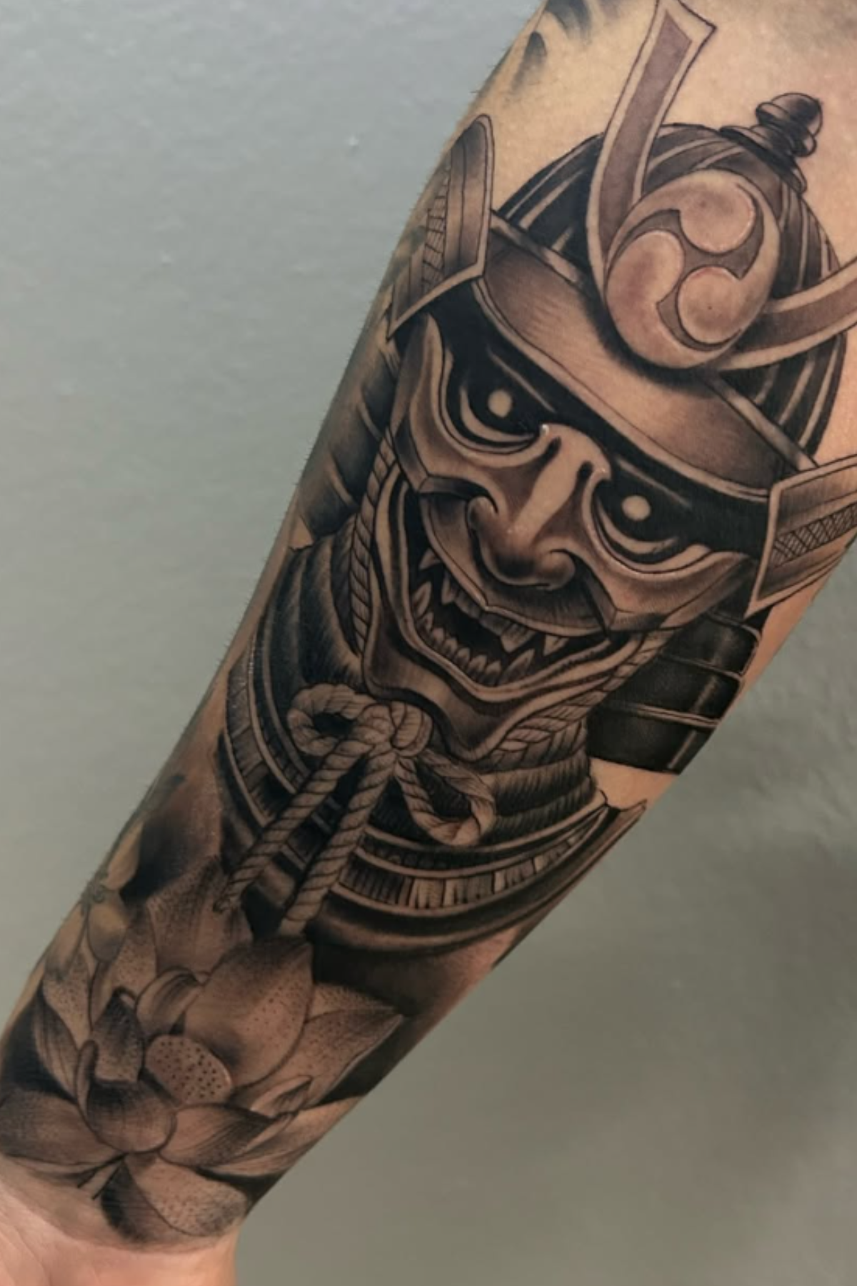 Detailed samurai arm tattoo by Alfonso