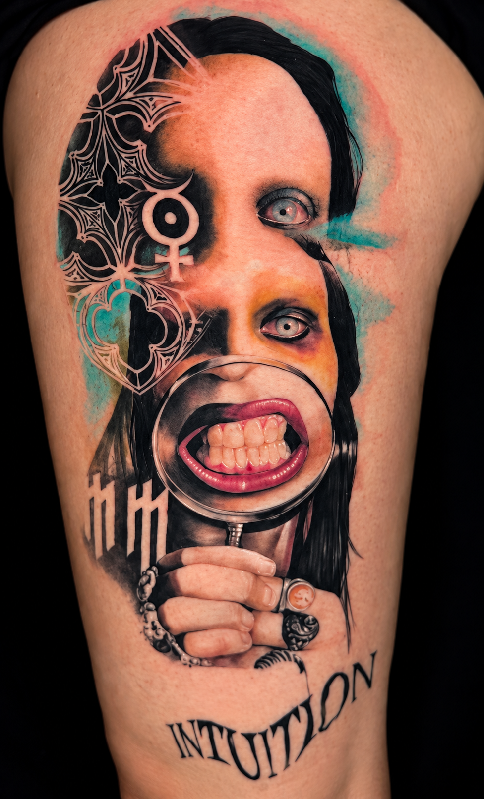 Surreal magnifying glass portrait tattoo by Ajay