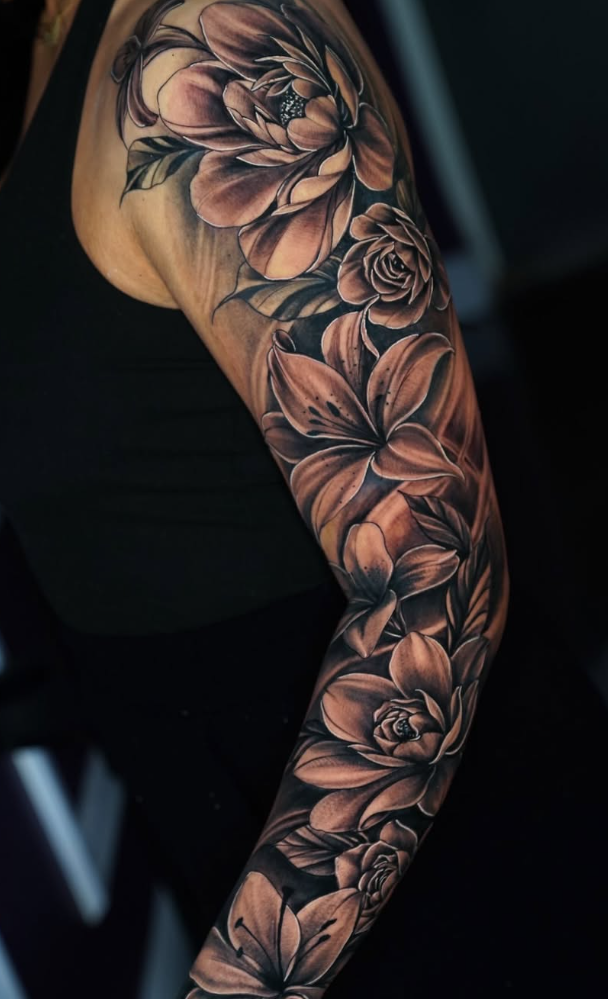 Black and grey lion portrait tattoo by Axel