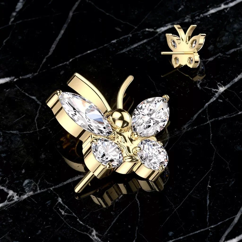 Back view of luxury 14k gold flower body piercing jewelry with diamond accents