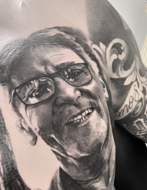 Black and grey realistic portrait tattoo by Macu at Salvation Tattoo Lounge in Coral Springs