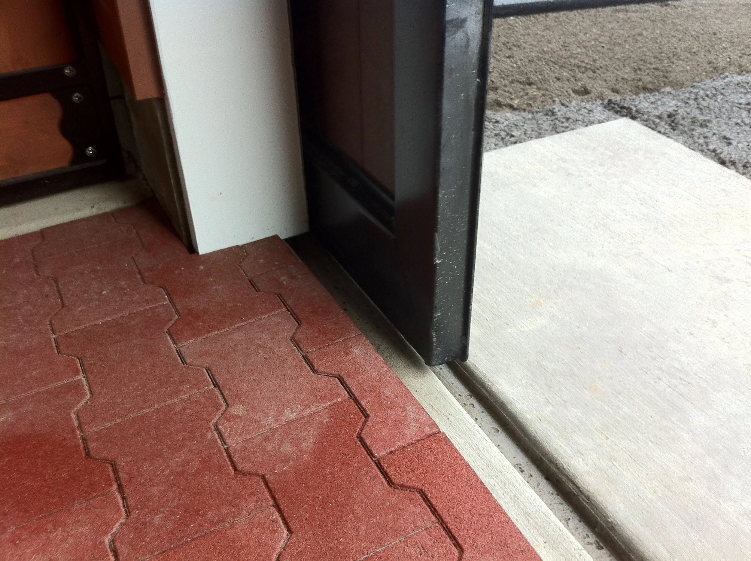 Glue Down vs. Dry Set Rubber Pavers: Which Installation Method Is Right for Your Barn?