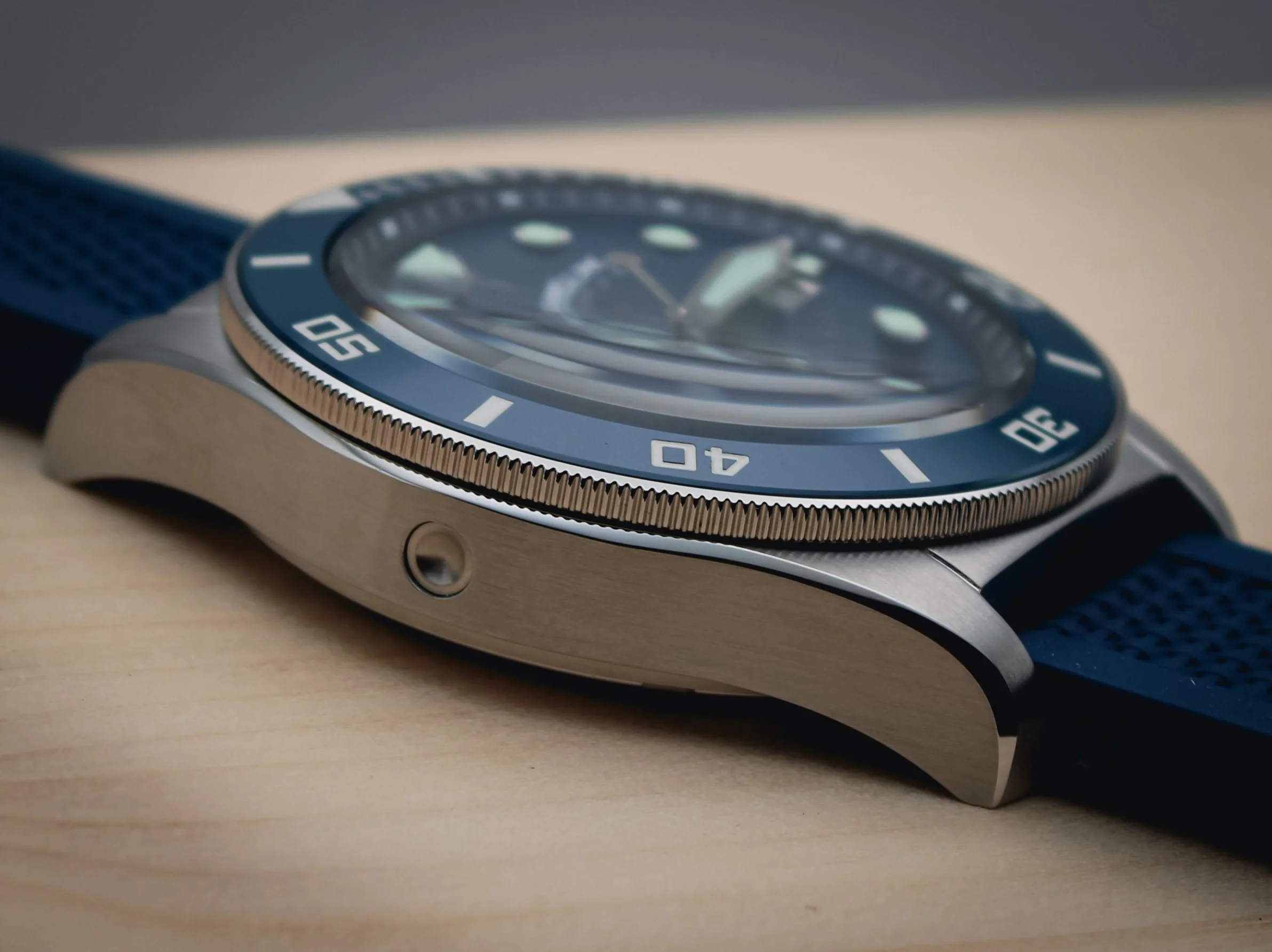 Close-up of a blue X Series dive watch.