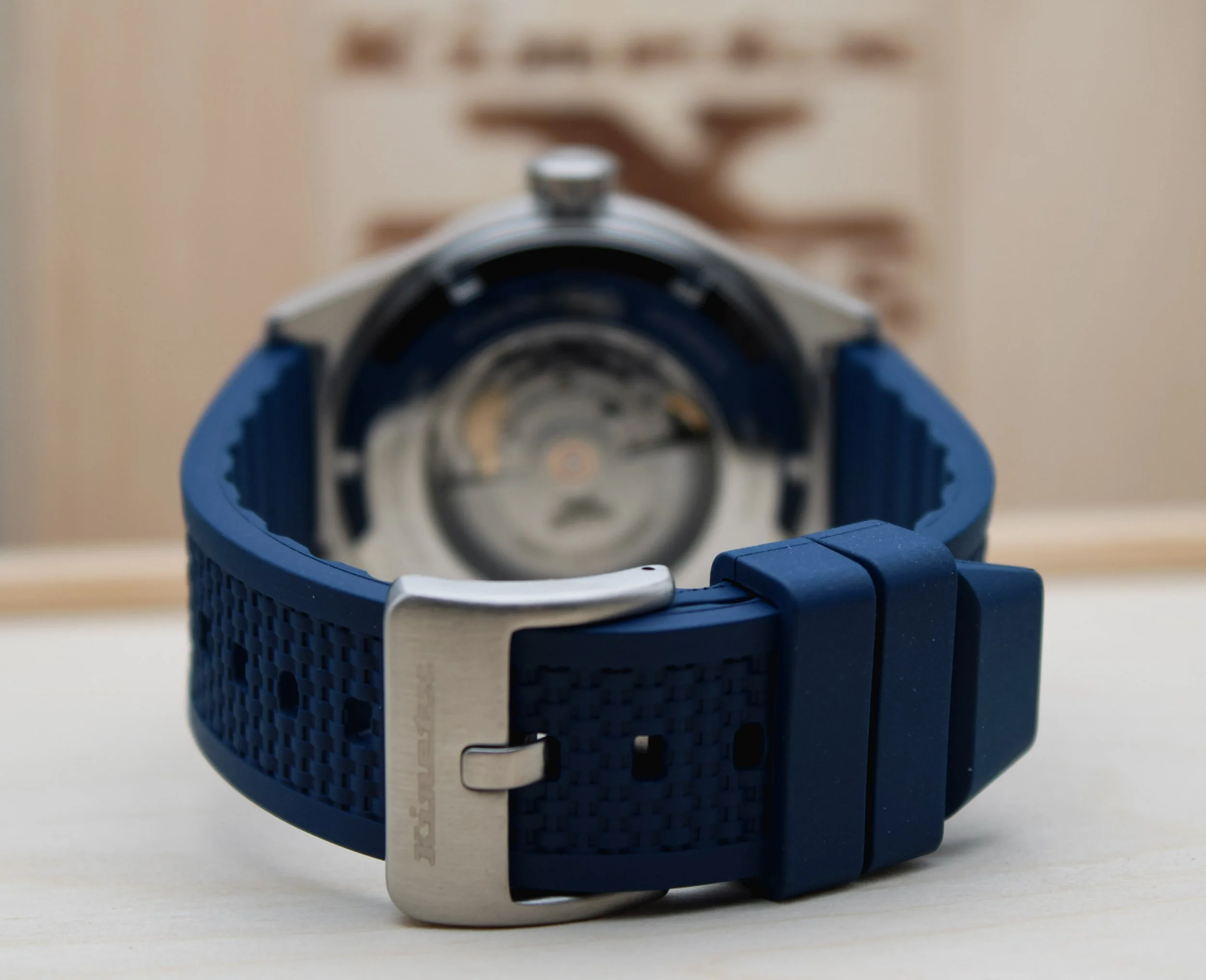Close-up of the back of a wristwatch.