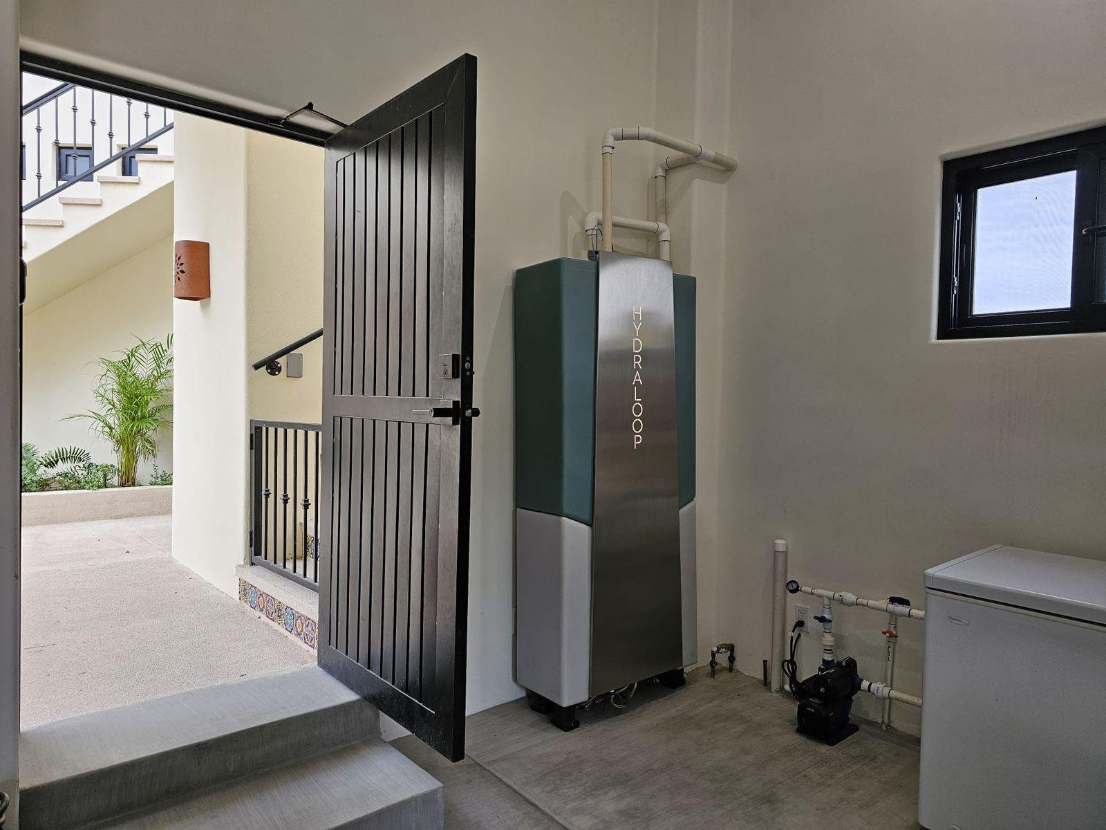 Laundry room with a Hydroloop water recycling system