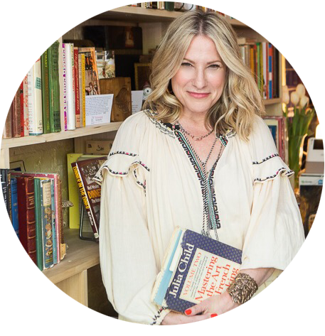 portrait of Lauren Deen in a book store as featured in Cherry Bombe magazine