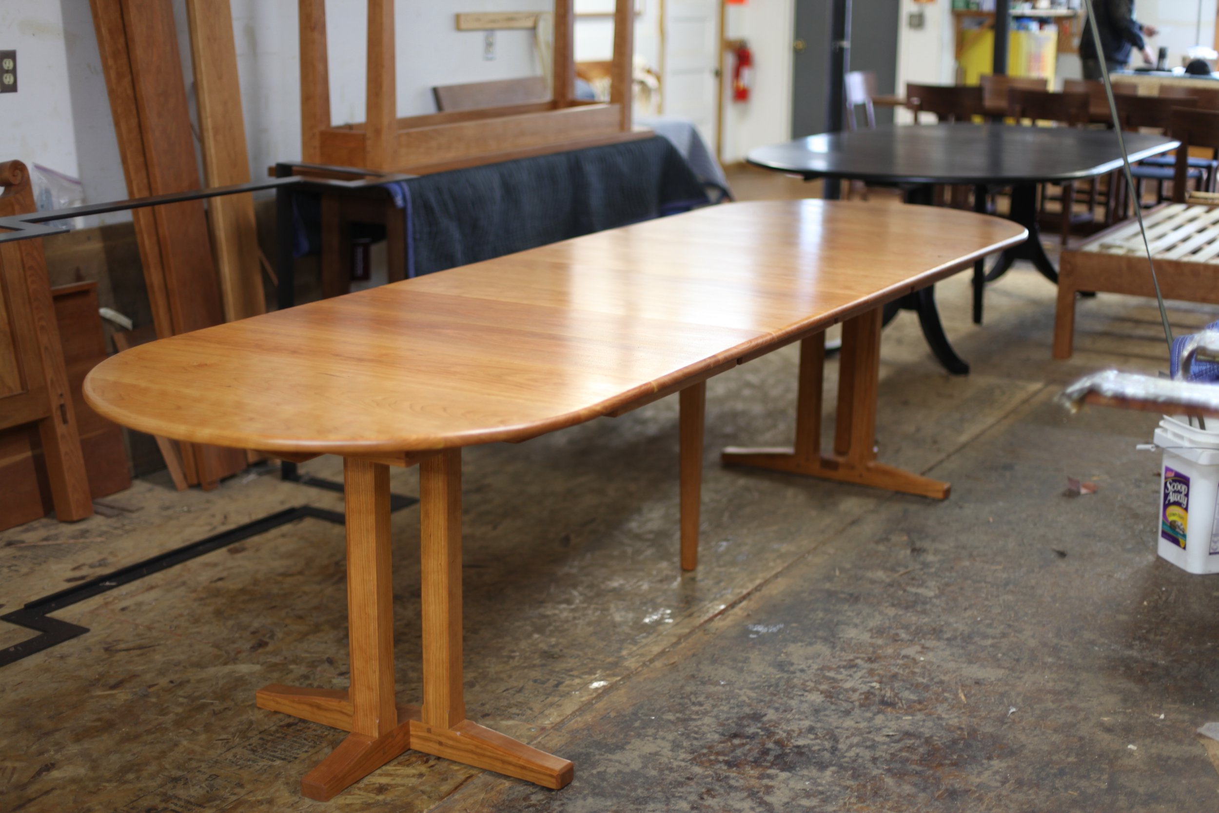An extending split pedestal table in cherry wood. Made by me at ShackletonThomas 2017