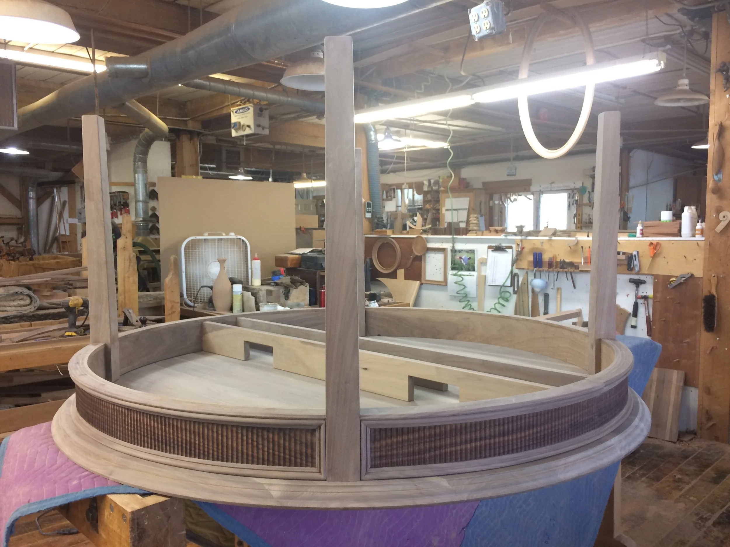 Round extending Higgins table in black walnut for ShackletonThomas